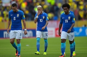 Brazil's Neymar Jr, Brazil's Renato Augusto and Brazil's Willian during their 2018 FIFA World Cup qualifying football match between Ecuador and Brazil at the Atahualpa stadium in Quito, on September 1, 2016. / AFP / RODRIGO BUENDIA        (Photo credit sh
