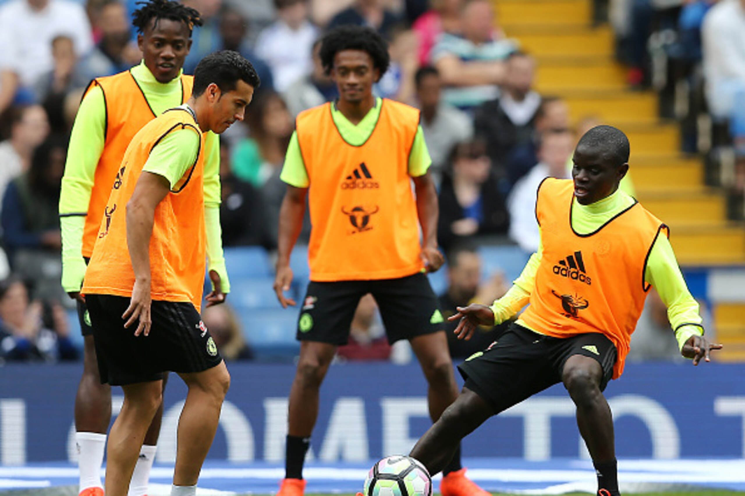 Chelsea's French midfielder N'Golo Kante (R) takes part in a training session at Chelsea's Stamford Bridge Stadium in London on August 10, 2016, ahead of the start of the English Premiership season on Saturday August 13, 2016.  / AFP / JUSTIN TALLIS /    