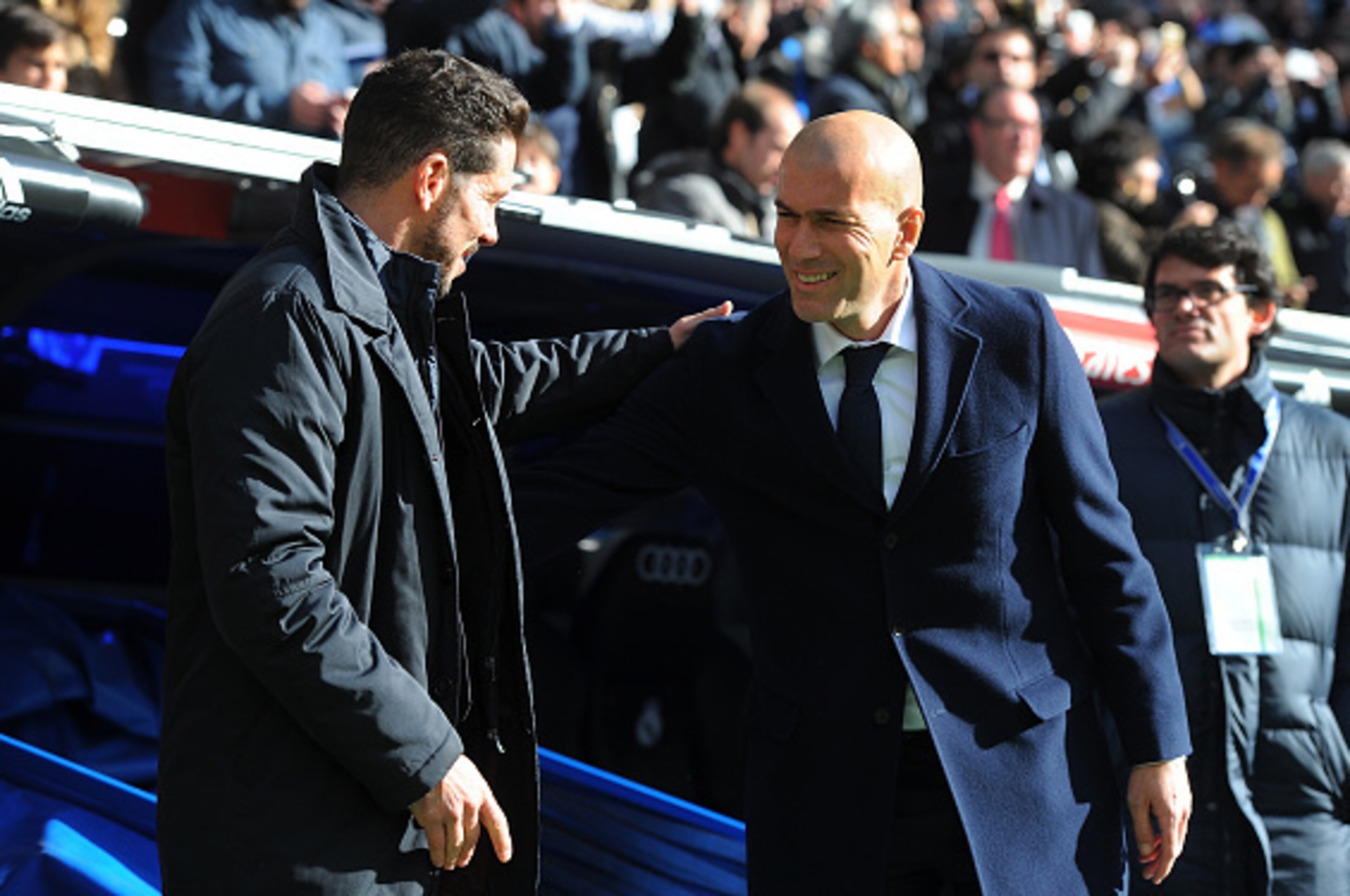 MADRID, SPAIN - FEBRUARY 27: Manager Diego Simeone of Club Atletico de Madrid greets Real Madrid manager Zinedine Zidane during the La Liga match between Real Madrid CF and Club Atletico de Madrid at Estadio Santiago Bernabeu on February 27, 2016 in Madr MADRID, SPAIN - FEBRUARY 27: Manager Diego Simeone of Club Atletico de Madrid greets Real Madrid manager Zinedine Zidane during the La Liga match between Real Madrid CF and Club Atletico de Madrid at Estadio Santiago Bernabeu on February 27, 2016 in Madr