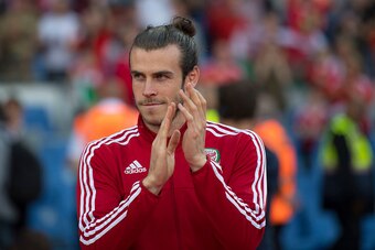 CARDIFF, WALES - JULY 08:  Gareth Bale of Wales looks on during a ceremony at the Cardiff City Stadium on July 8, 2016 in Cardiff, Wales. The players toured the streets of Cardiff in an open top bus before arriving at the Cardiff City Stadium for an after