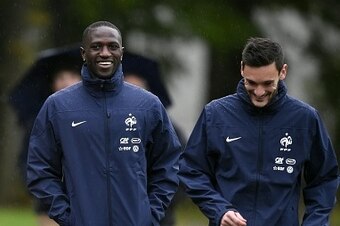 French headcoach Didier Deschamps (L), midfielder Moussa Sissoko (C) and goalkeeper and captain Hugo Lloris arrive to take part in a training session in Clairefontaine-en-Yvelines on October 6, 2014, a few days prior to a friendly football match between F