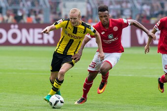 Dortmund, Germany 27.07.2016, 1.Bundesliga 1. Spieltag, BV Borussia Dortmund - 1. FSV Mainz 05, 2:1, Sebastian Rode (BVB) gegen  Jean-Philippe Gbamin (Mainz)   (Photo by TF-Images/Getty Images)