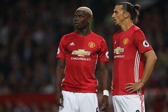 MANCHESTER, ENGLAND - AUGUST 19: Paul Pogba and Zlatan Ibrahimovic of Manchester United during the Premier League match between Manchester United and  Southampton at Old Trafford on August 19, 2016 in Manchester, England. (Photo by Matthew Ashton - AMA/Ge