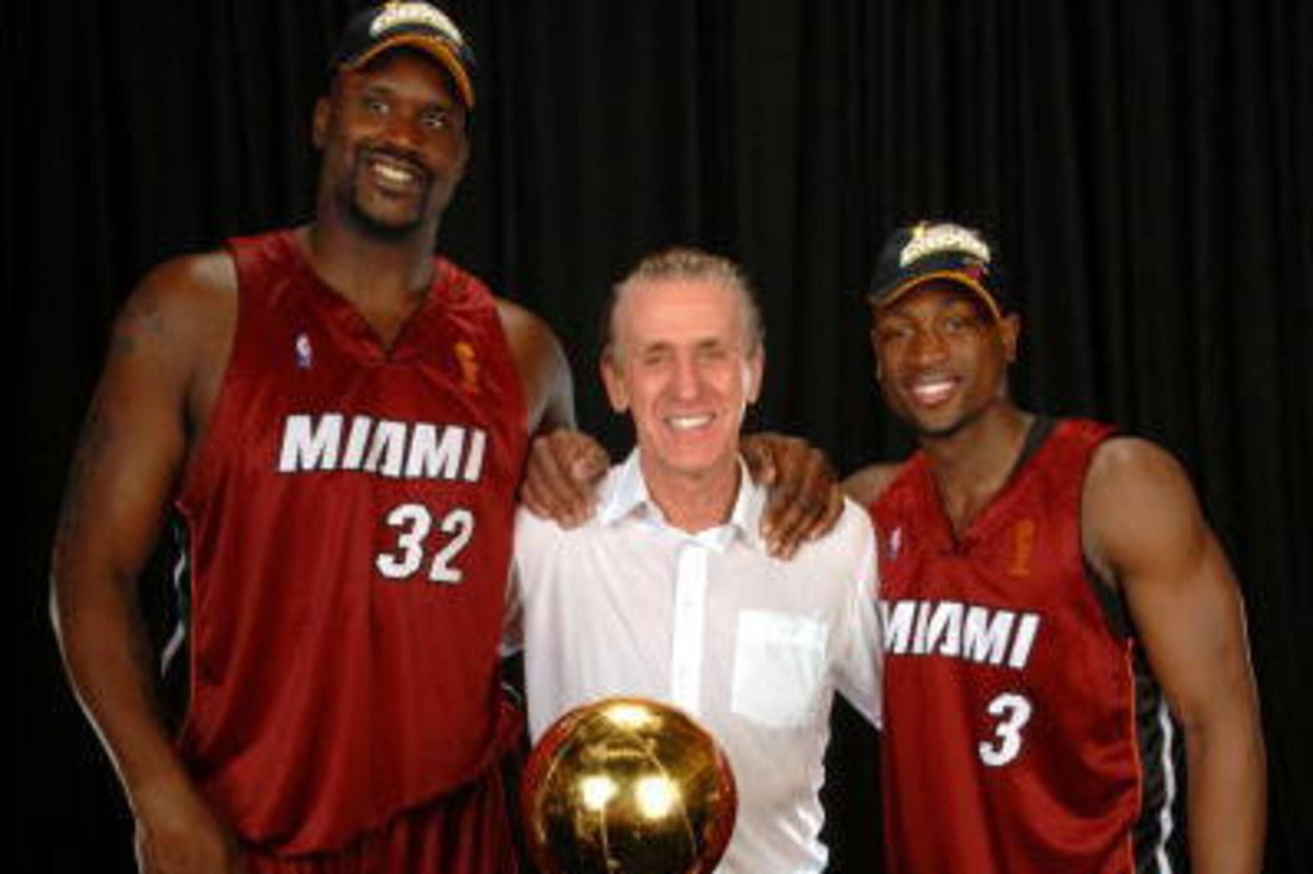 DALLAS - JUNE 20: Shaquille O'Neal#32, head coach Pat Riley and Dwyane Wade#3 of the Miami Heat poses for a portrait with the Larry O'Brien Championship trophy after their 95-92 Game Six victory of the 2006 NBA Finals against the Dallas Mavericks on June DALLAS - JUNE 20: Shaquille O'Neal#32, head coach Pat Riley and Dwyane Wade#3 of the Miami Heat poses for a portrait with the Larry O'Brien Championship trophy after their 95-92 Game Six victory of the 2006 NBA Finals against the Dallas Mavericks on June