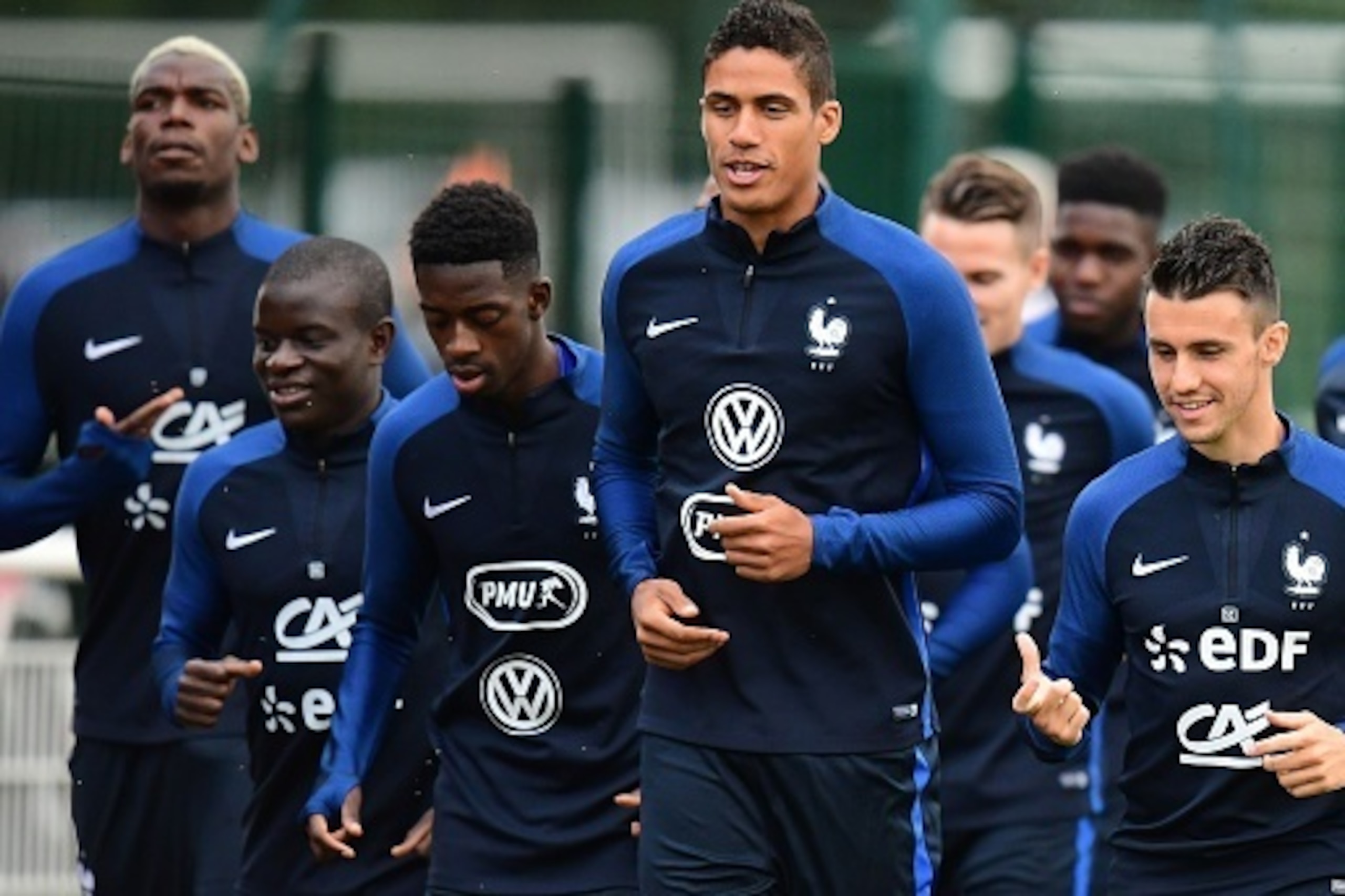 (From L) France's midfielder Paul Pogba, midfielder N'Golo Kante, forward Ousmane Dembele, defender Raphael Varane and defender Sebastien Corchia attend in a training session in Clairefontaine-en-Yvelines on August 29, 2016, as part of the team's preparat