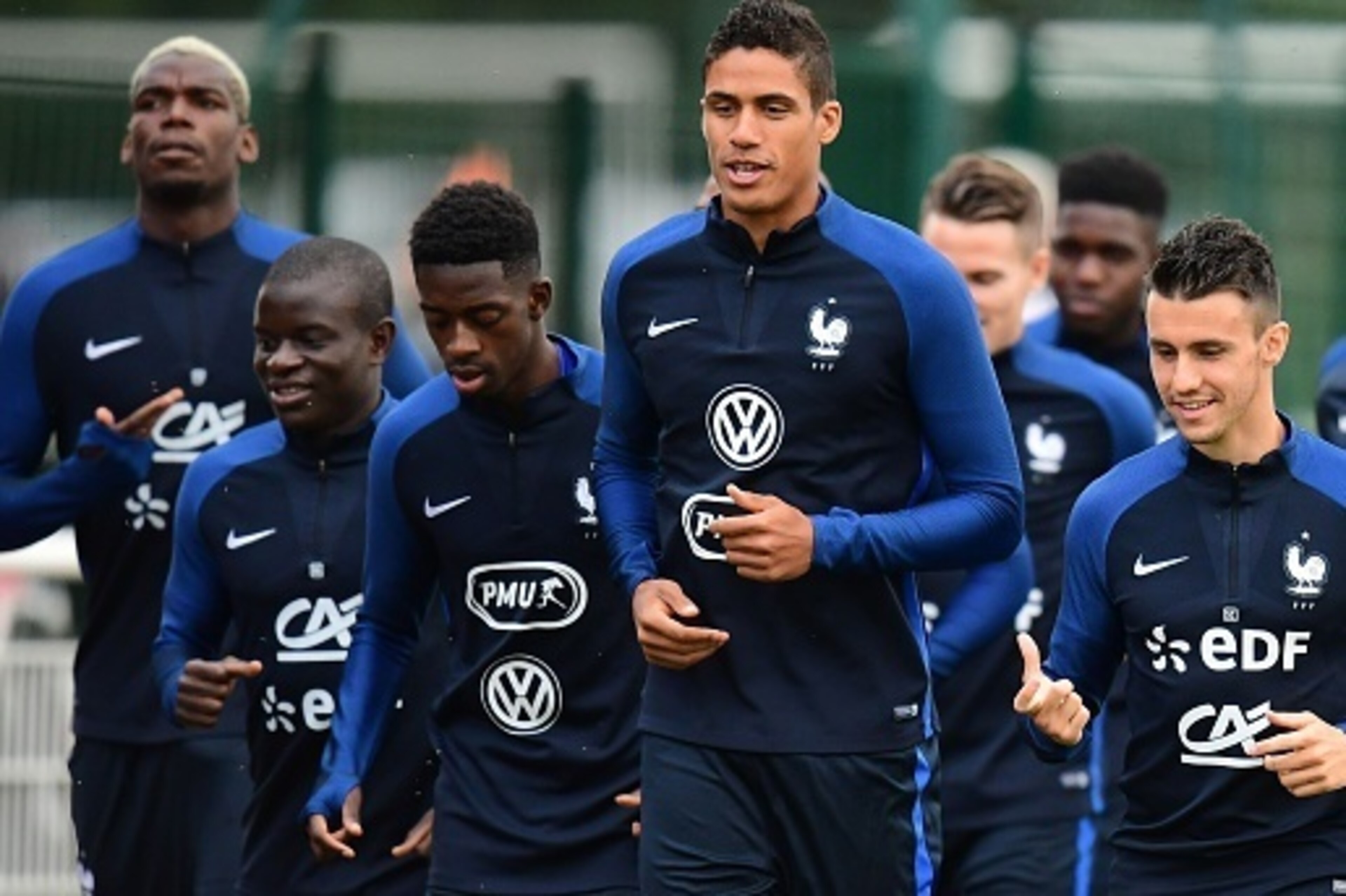 (From L) France's midfielder Paul Pogba, midfielder N'Golo Kante, forward Ousmane Dembele, defender Raphael Varane and defender Sebastien Corchia attend in a training session in Clairefontaine-en-Yvelines on August 29, 2016, as part of the team's preparat