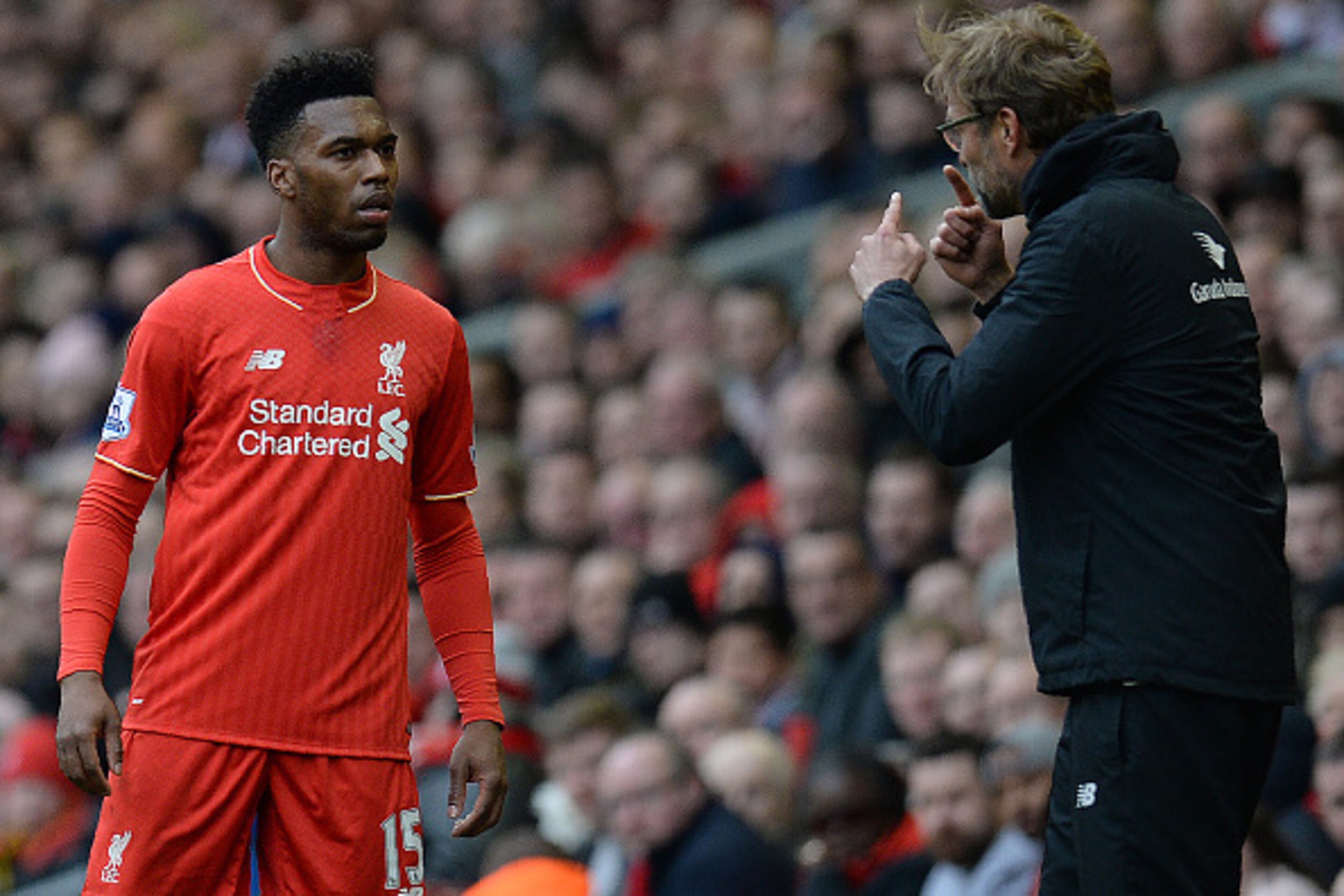 Liverpool's German manager Jurgen Klopp (R) gives instructions to Liverpool's English striker Daniel Sturridge during the English Premier League football match between Liverpool and Stoke City at Anfield in Liverpool, northwest England on April 10, 2016. 