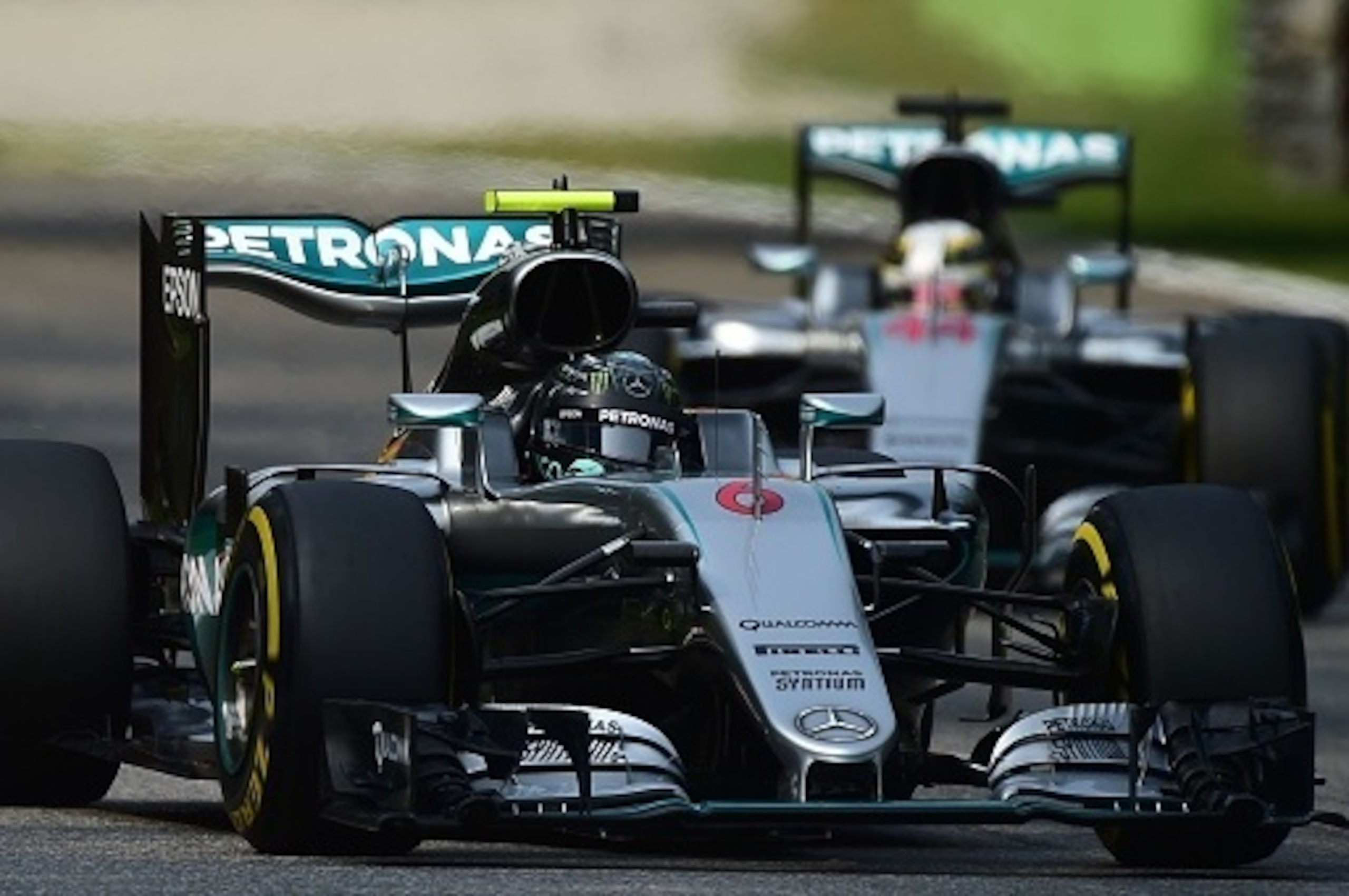 Mercedes AMG Petronas F1 Team's German driver Nico Rosberg drives ahead of Mercedes AMG Petronas F1 Team's British driver Lewis Hamilton during the third practice session at the Autodromo Nazionale circuit in Monza on September 3, 2016 ahead of the Italia