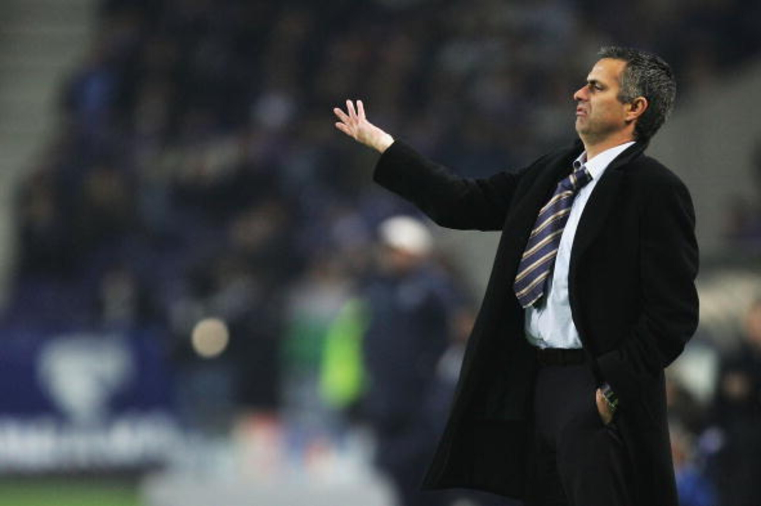 PORTO, PORTUGAL - DECEMBER 7:  Manager Jose Mourinho of Chelsea appeals to the referee about a player diving during the Champions League Group H match against FC Porto and Chelsea at the Estadio Do Dragao on December 7, 2004 in Porto, Portugal. (Photo by 