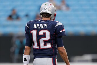CHARLOTTE, NC - AUGUST 26:  Tom Brady #12 of the New England Patriots warms up prior to their game against the Carolina Panthers during their game at Bank of America Stadium on August 26, 2016 in Charlotte, North Carolina.  (Photo by Streeter Lecka/Getty 