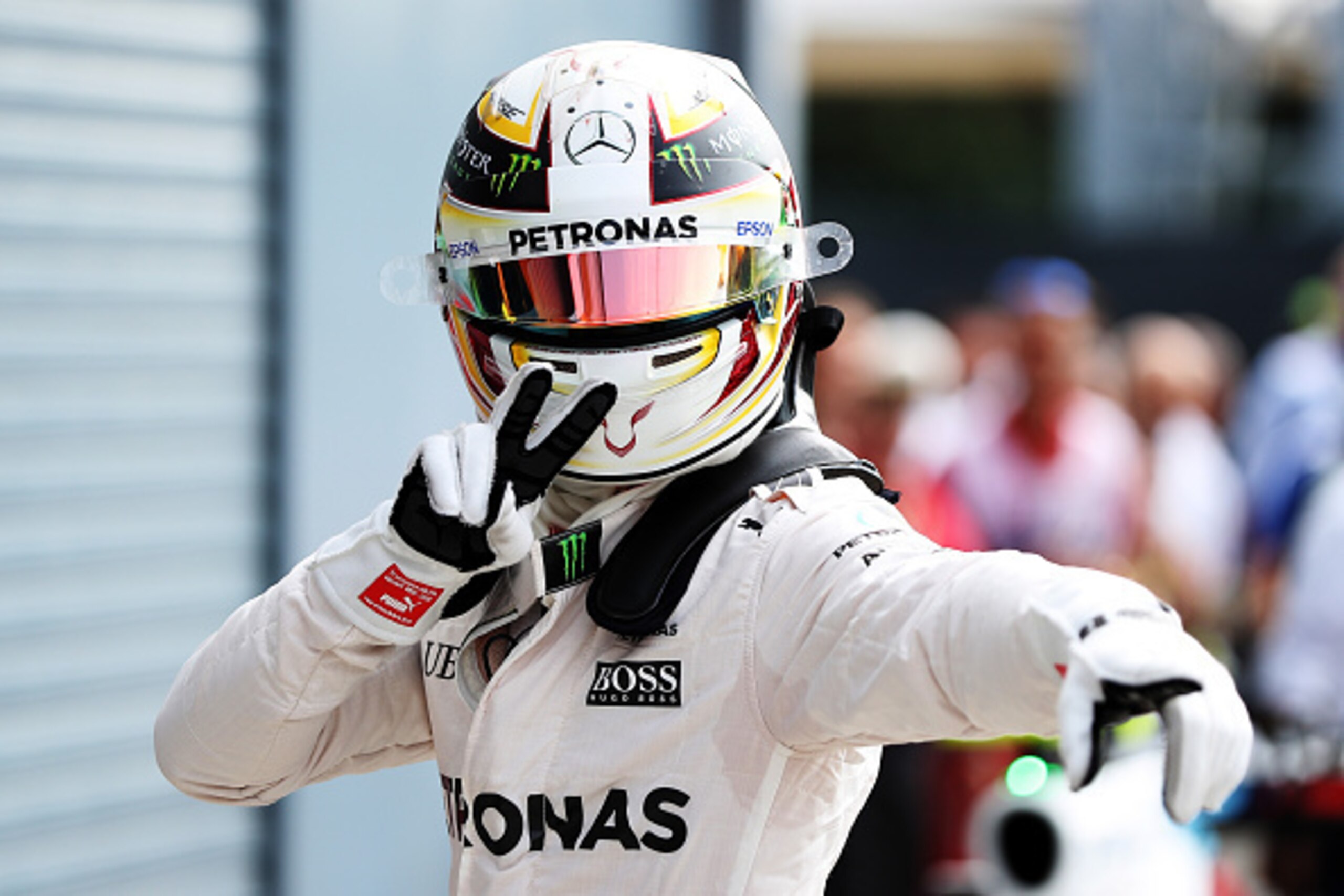MONZA, ITALY - SEPTEMBER 03: Lewis Hamilton of Great Britain and Mercedes GP celebrates getting pole position in parc ferme during qualifying for the Formula One Grand Prix of Italy at Autodromo di Monza on September 3, 2016 in Monza, Italy.  (Photo by Ma