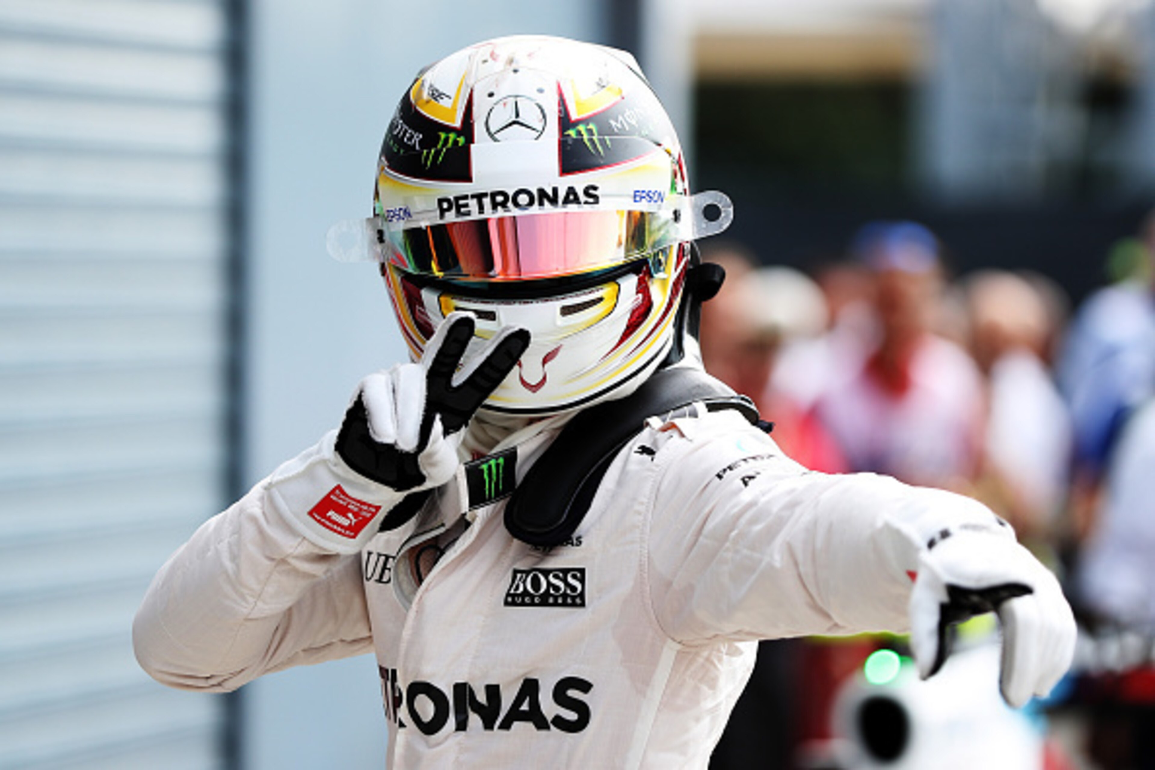 MONZA, ITALY - SEPTEMBER 03: Lewis Hamilton of Great Britain and Mercedes GP celebrates getting pole position in parc ferme during qualifying for the Formula One Grand Prix of Italy at Autodromo di Monza on September 3, 2016 in Monza, Italy.  (Photo by Ma