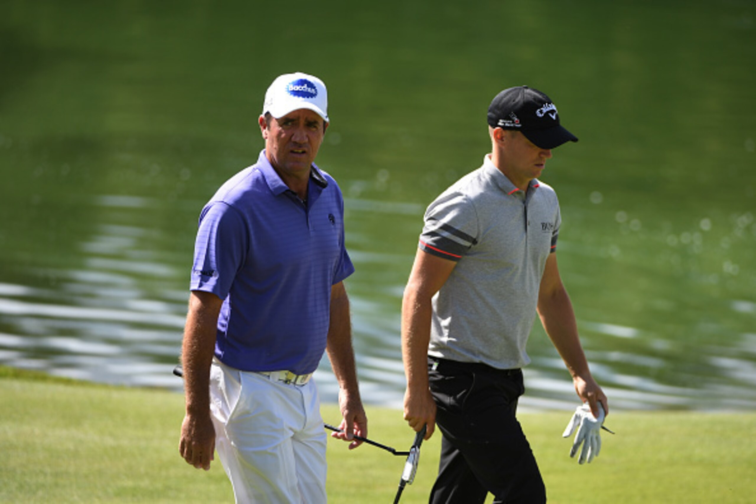 CRANS-MONTANA, SWITZERLAND - SEPTEMBER 03:  Scott Hend of Australia and Alex Noren of Sweden  walk down the fairway on the 13th hole during the third round of the Omega European Masters at Crans-sur-Sierre Golf Club on September 3, 2016 in Crans-Montana, 