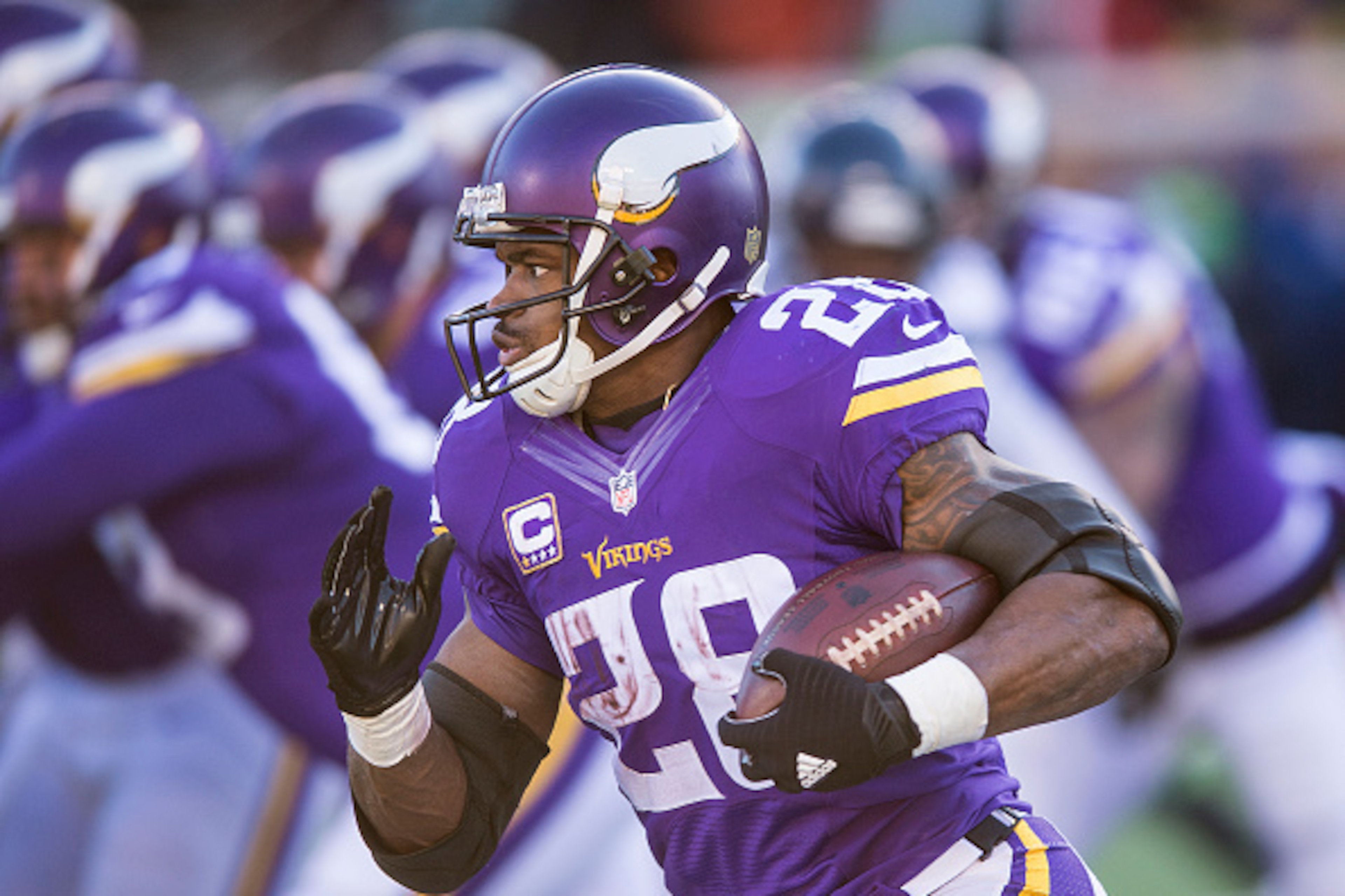 MINNEAPOLIS, MN - JANUARY 10: Adrian Peterson #28 of the Minnesota Vikings carries the ball during an NFL game against the Seattle Seahawks at TCF Bank Stadium January 10, 2016 in Minneapolis, Minnesota.  (Photo by Tom Dahlin/Getty Images)