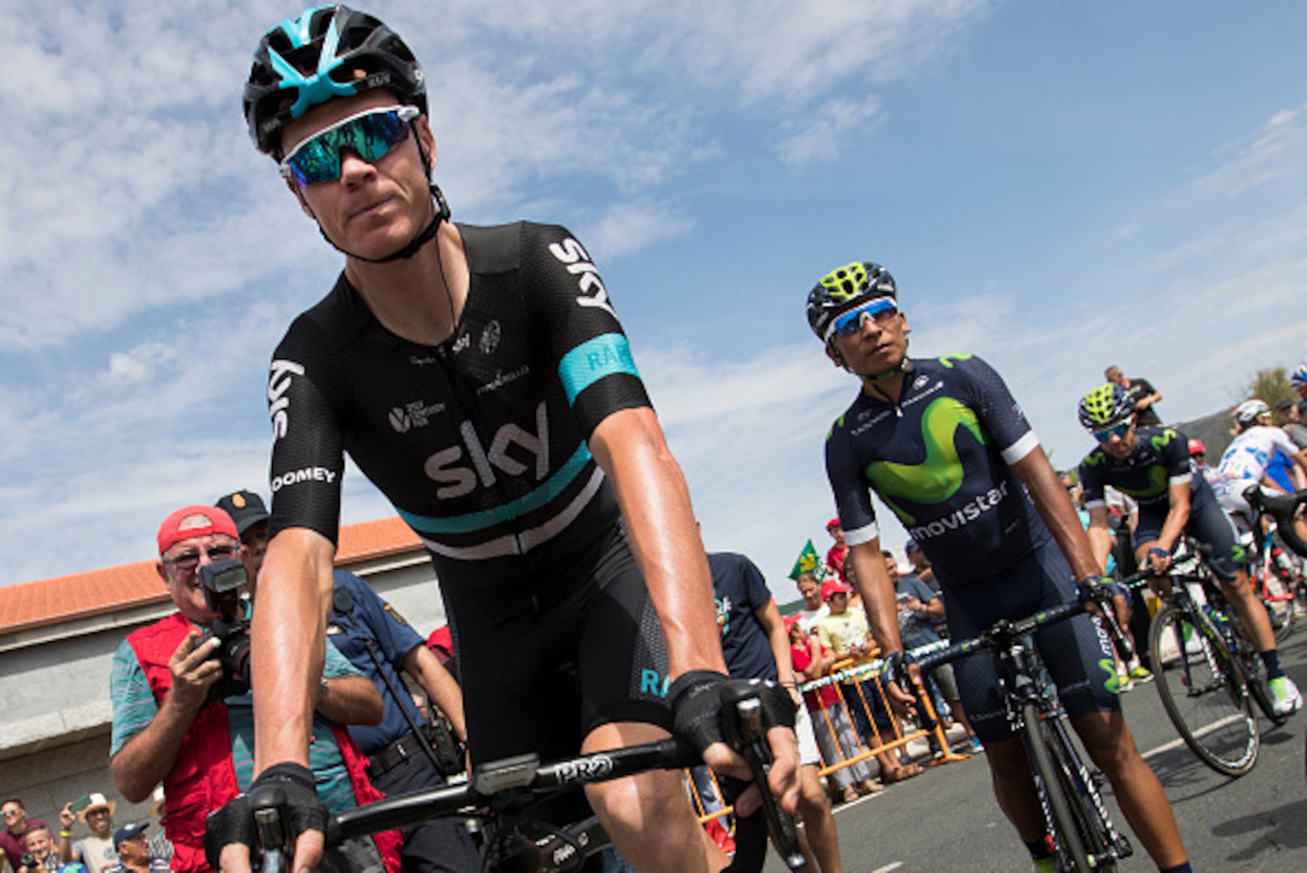 Sky's British cyclist Chris Froome (L) and Movistar's Colombian cyclist Nairo Quintana during the signature ceremony prior to the 7th stage of the 71st edition of 'La Vuelta' Tour of Spain, a 158,5 km route between Maceda to Puebla de Sanabria on August 2