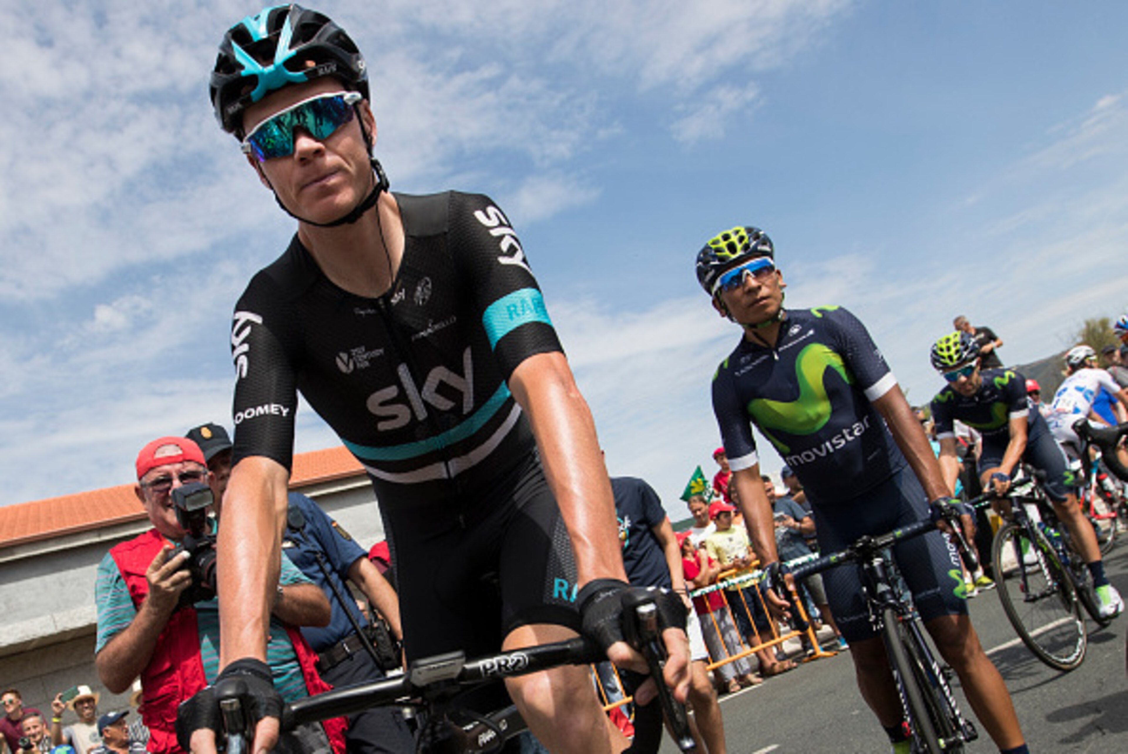 Sky's British cyclist Chris Froome (L) and Movistar's Colombian cyclist Nairo Quintana during the signature ceremony prior to the 7th stage of the 71st edition of 'La Vuelta' Tour of Spain, a 158,5 km route between Maceda to Puebla de Sanabria on August 2