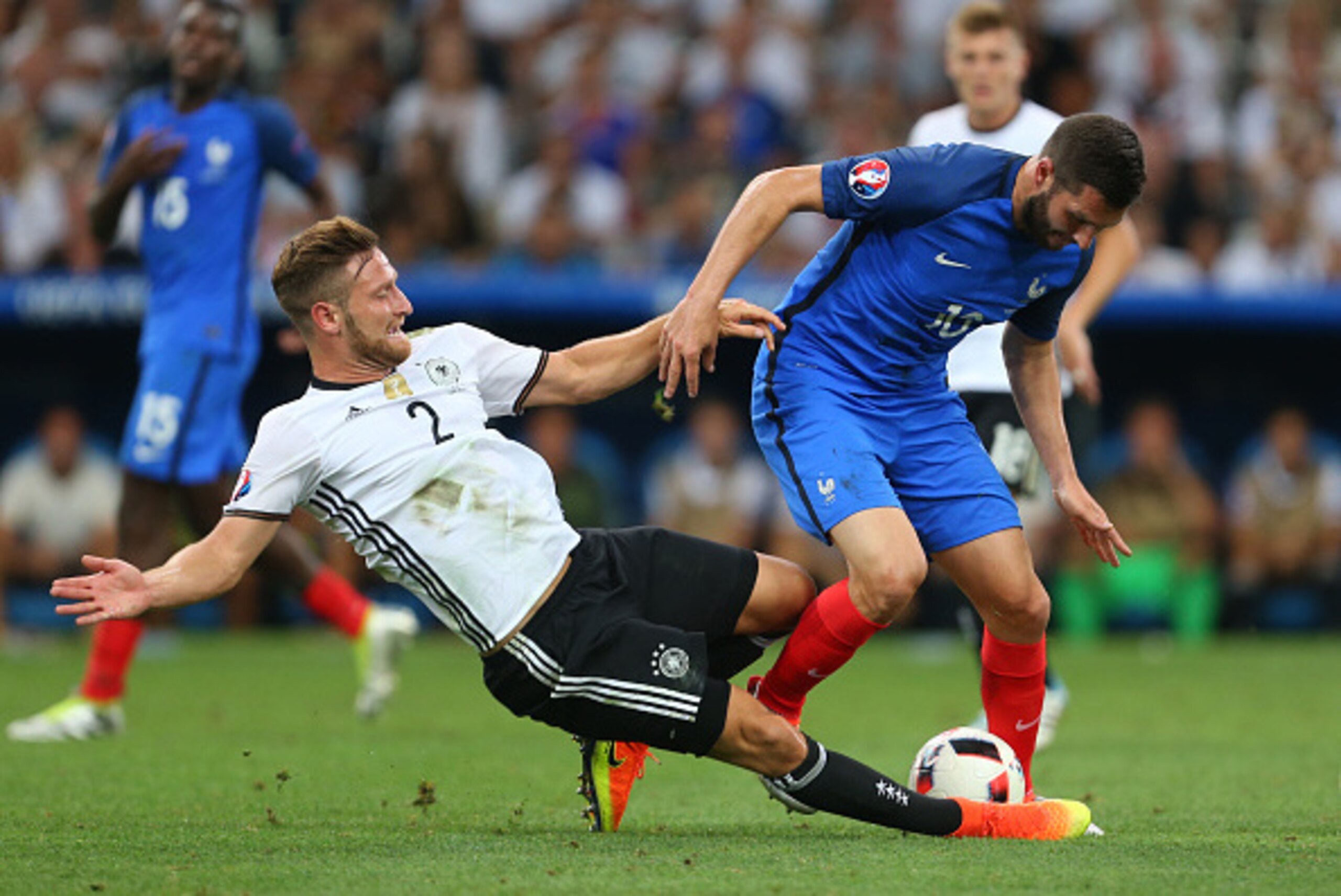 MARSEILLE, FRANCE - JULY 07: Shkodran Mustafi of Germany tackles Andre-Pierre Gignac of France during the UEFA Euro 2016 semi final match between Germany and France at Stade Velodrome on July 7, 2016 in Marseille, France. (Photo by Catherine Ivill - AMA/G