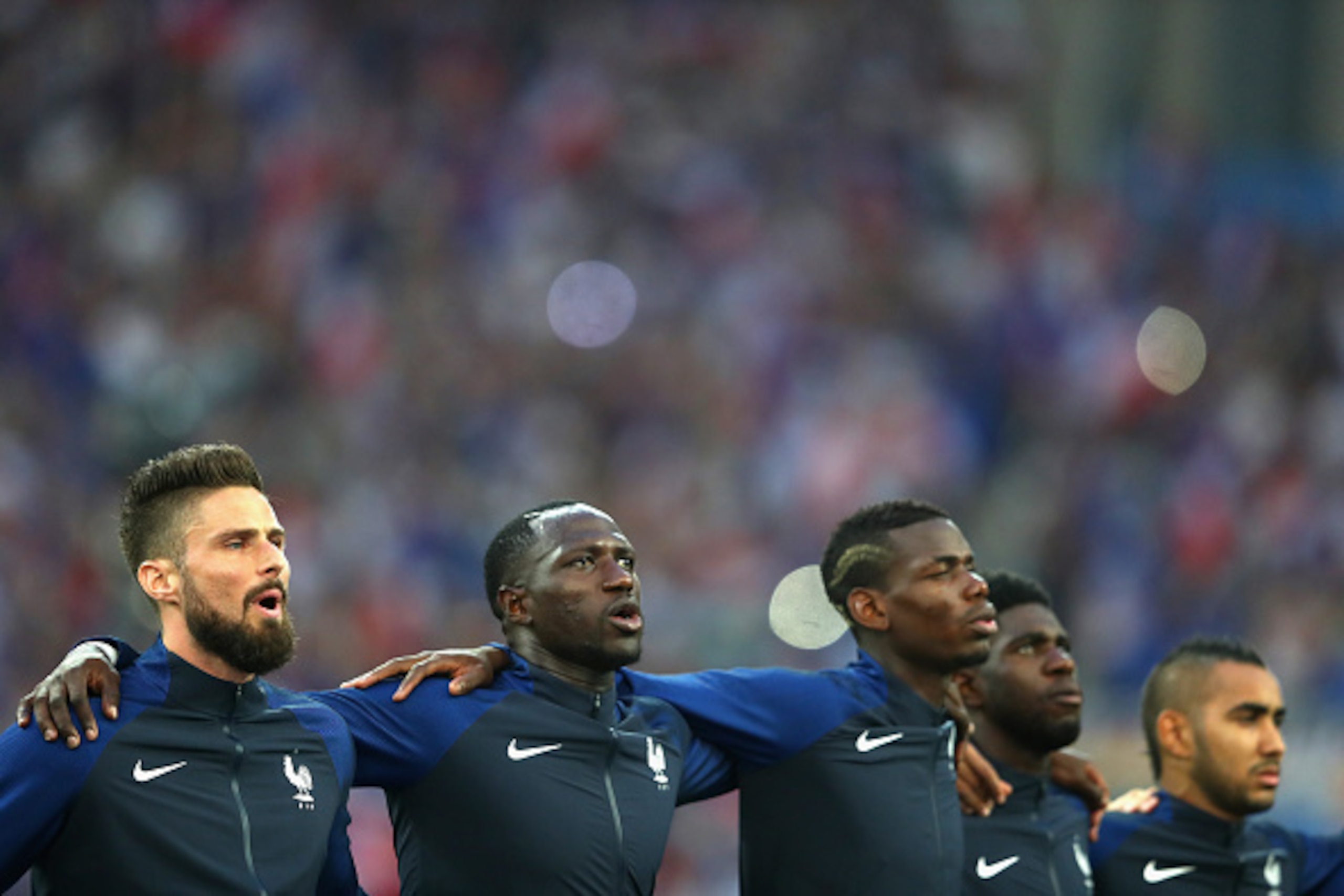 MARSEILLE, FRANCE - JULY 07: (L to R) Olivier Giroud, Moussa Sissoko, Paul Pogba, Samuel Umtiti and Dimitri Payet of France line up for the national anthem prior to the UEFA EURO semi final match between Germany and France at Stade Velodrome on July 7, 20