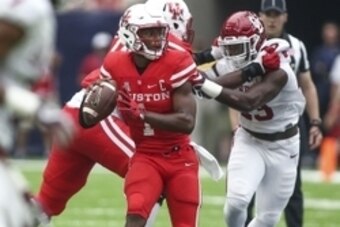 Sep 3, 2016; Houston, TX, USA; Houston Cougars quarterback Greg Ward Jr. (1) looks for an open receiver during the second quarter against the Oklahoma Sooners at NRG Stadium. Mandatory Credit: Troy Taormina-USA TODAY Sports
