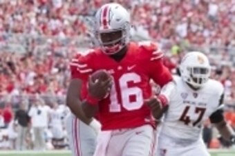 Sep 3, 2016; Columbus, OH, USA; Ohio State Buckeyes quarterback J.T. Barrett (16) scores against the Bowling Green Falcons at Ohio Stadium. Mandatory Credit: Greg Bartram-USA TODAY Sports