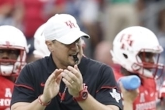 Sep 3, 2016; Houston, TX, USA; Houston Cougars head coach Tom Herman watches warm up before playing against the Houston Cougars at NRG Stadium. Mandatory Credit: Thomas B. Shea-USA TODAY Sports