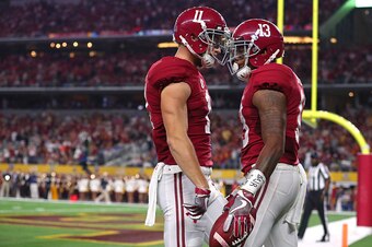 ARLINGTON, TX - SEPTEMBER 3: Gehrig Dieter #11 and ArDarius Stewart #13 of the Alabama Crimson Tide  celebrate a touchdown against the USC Trojans in the first half during the AdvoCare Classic at AT&T Stadium on September 3, 2016 in Arlington, Texas. (Pho