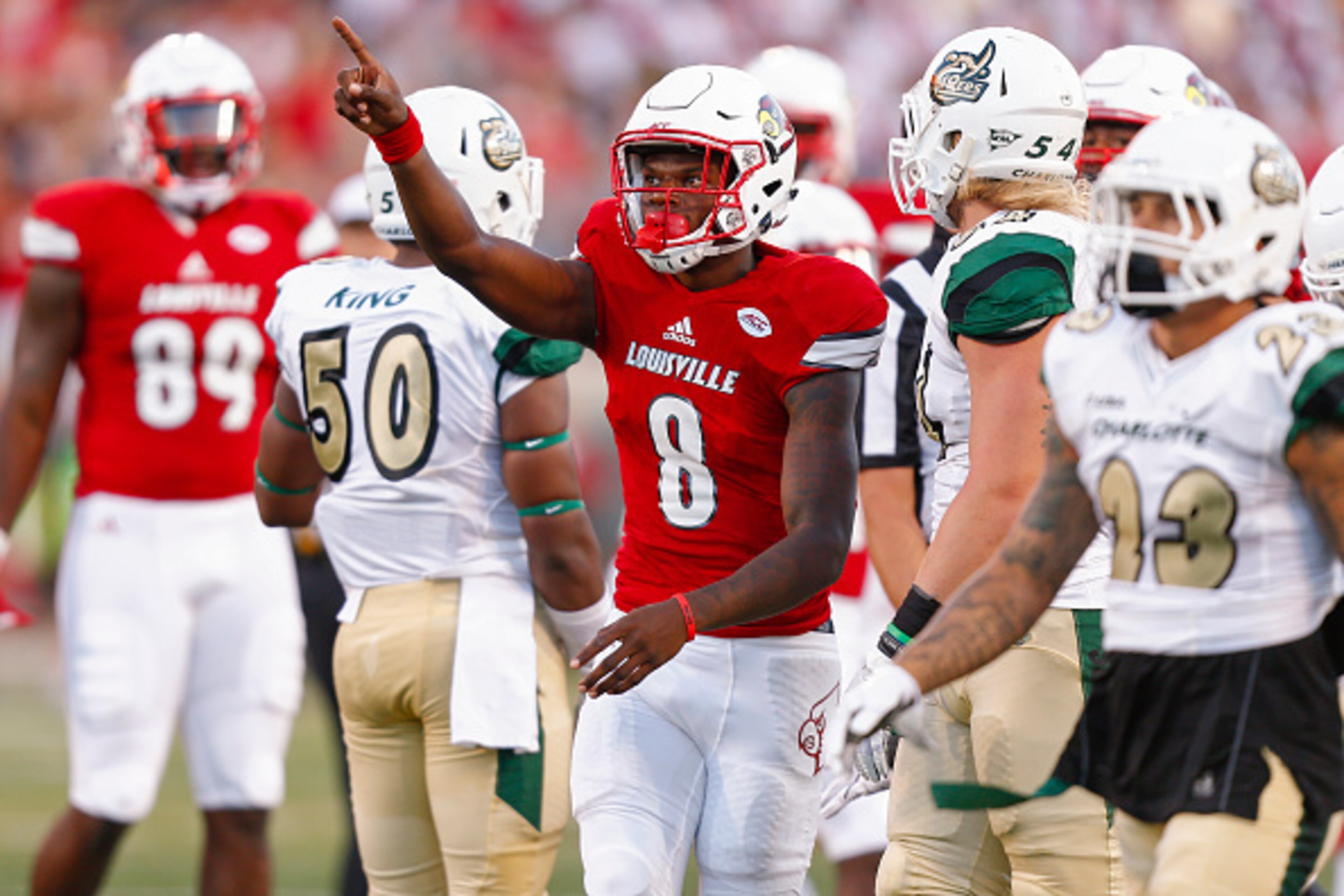 LOUISVILLE, KY - SEPTEMBER 01: Lamar Jackson #8 of the Louisville Cardinals signals a first down during the game against the Charlotte 49ers at Papa John's Cardinal Stadium on September 1, 2016 in Louisville, Kentucky. Louisville defeated Charlotte 70-14.