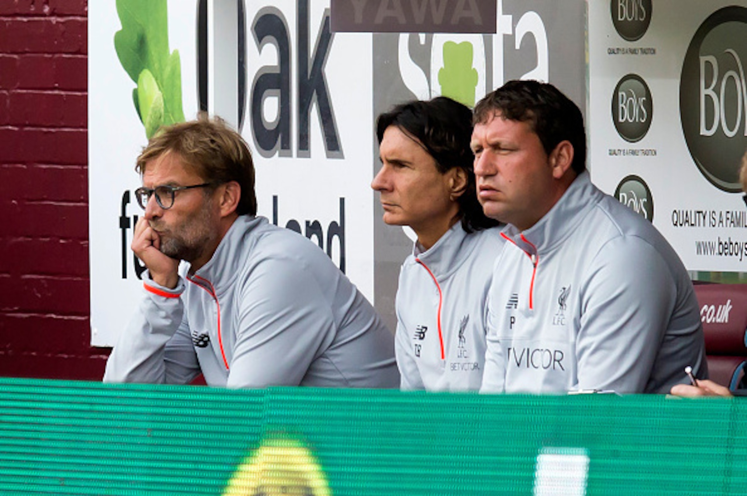 Liverpool's German manager Jurgen Klopp (L) looks on from the dugout during the English Premier League football match between Burnley and Liverpool at Turf Moor in Burnley, north west England on August 20, 2016.
Burnley won the game 2-0. / AFP / JON SUPER