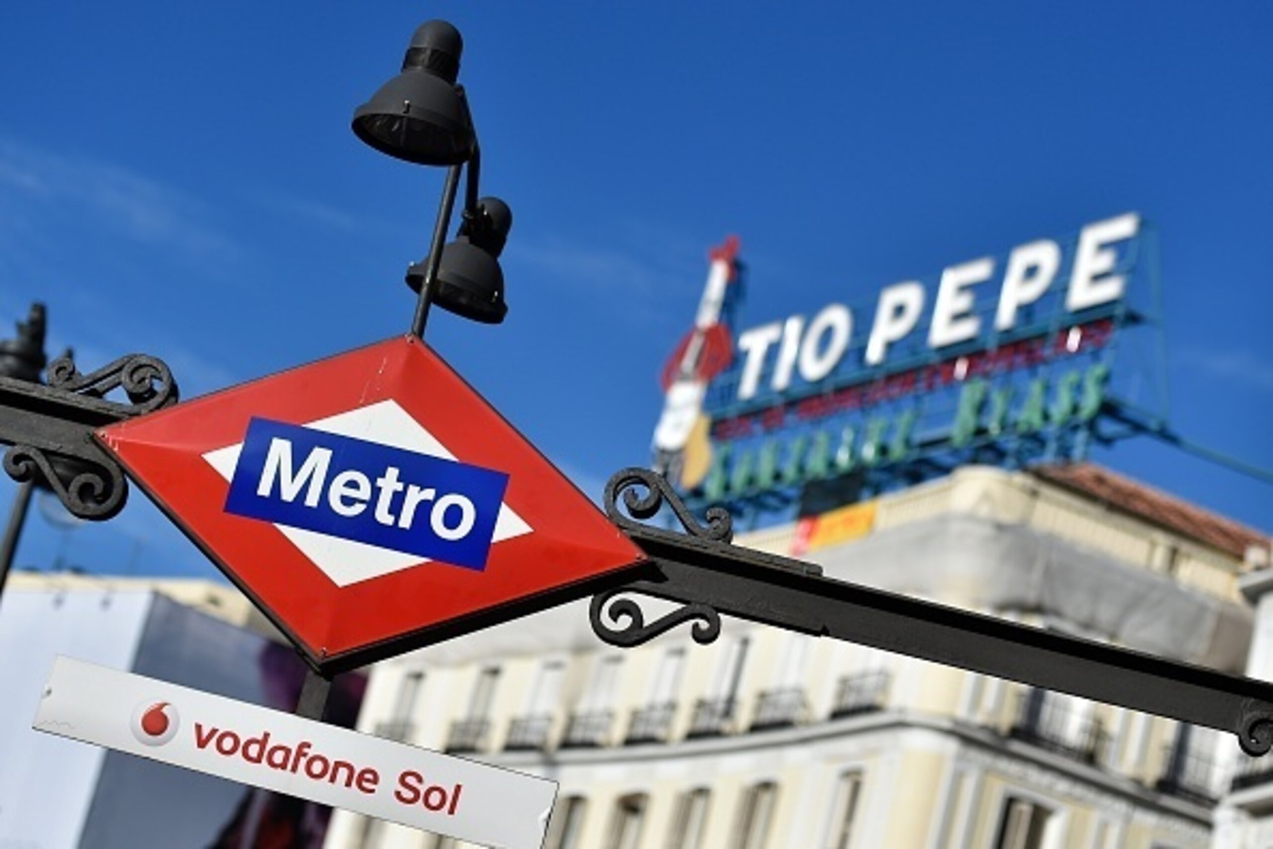 A picture taken on November 26, 2015 shows a Puerta del Sol metro sign at the Puerta del Sol square in the centre of Madrid.   AFP PHOTO/ GERARD JULIEN / AFP / GERARD JULIEN        (Photo credit should read GERARD JULIEN/AFP/Getty Images)