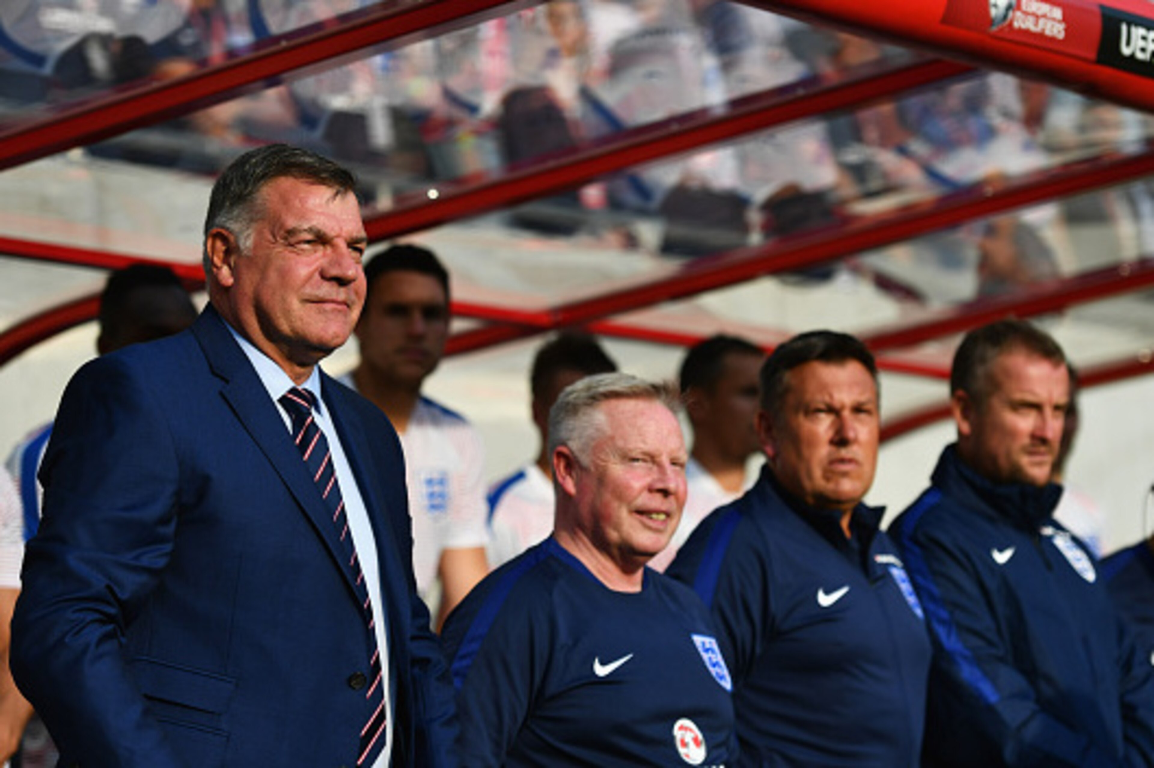 TRNAVA, SLOVAKIA - SEPTEMBER 04:  (L-R) Sam Allardyce manager of England, Sammy Lee assistant manager of England, Craig Shakespeare coach of England and Martyn Margetson goalkeeping coach of England look on prior to the 2018 FIFA World Cup Group F qualify