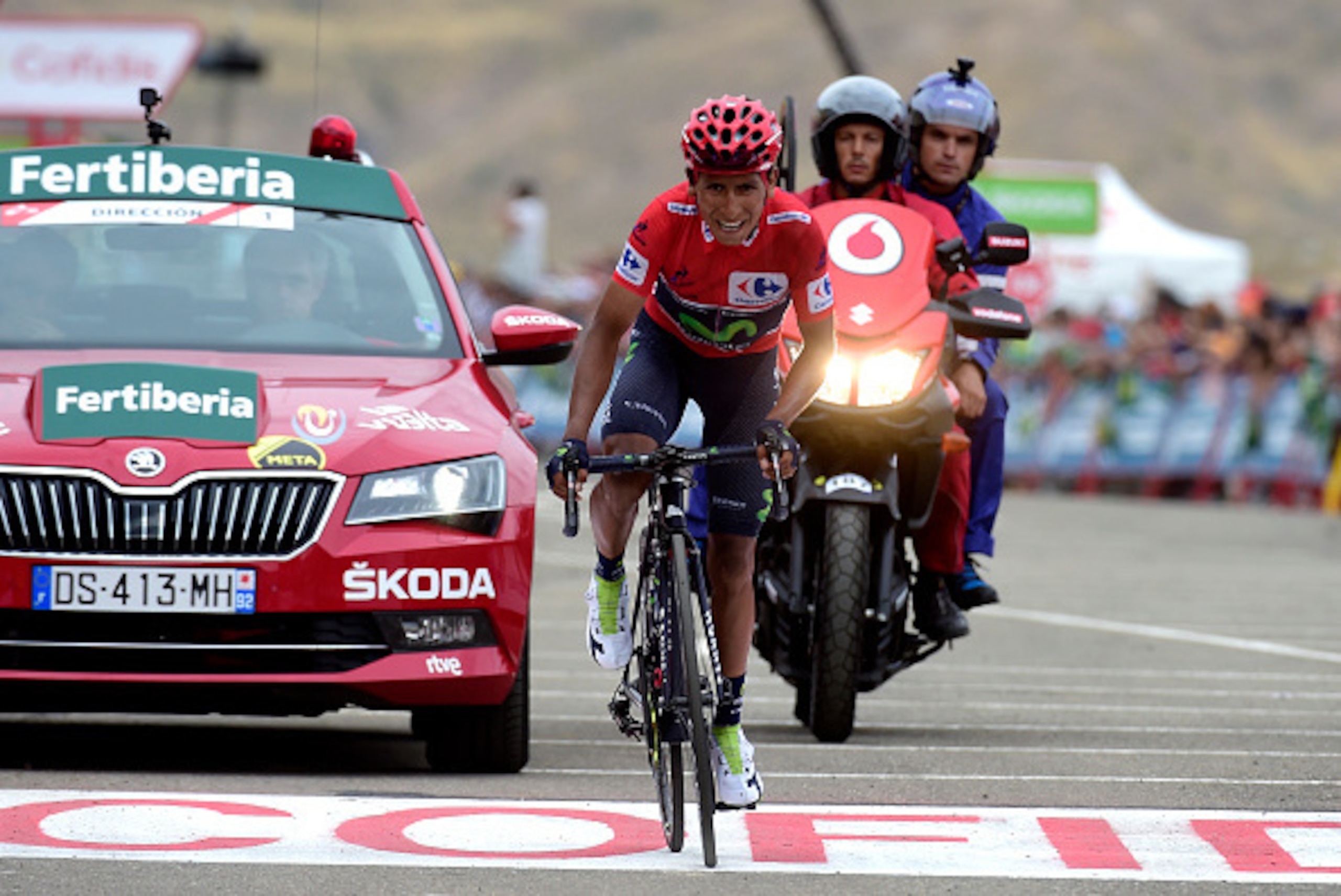 Movistar's Colombian cyclist Nairo Quintana crosses the finish line during the 15th stage of the 71st edition of 'La Vuelta' Tour of Spain, a 120km route Sabinanigo to Formigal, on September 4, 2016. / AFP / JOSE JORDAN        (Photo credit should read JO