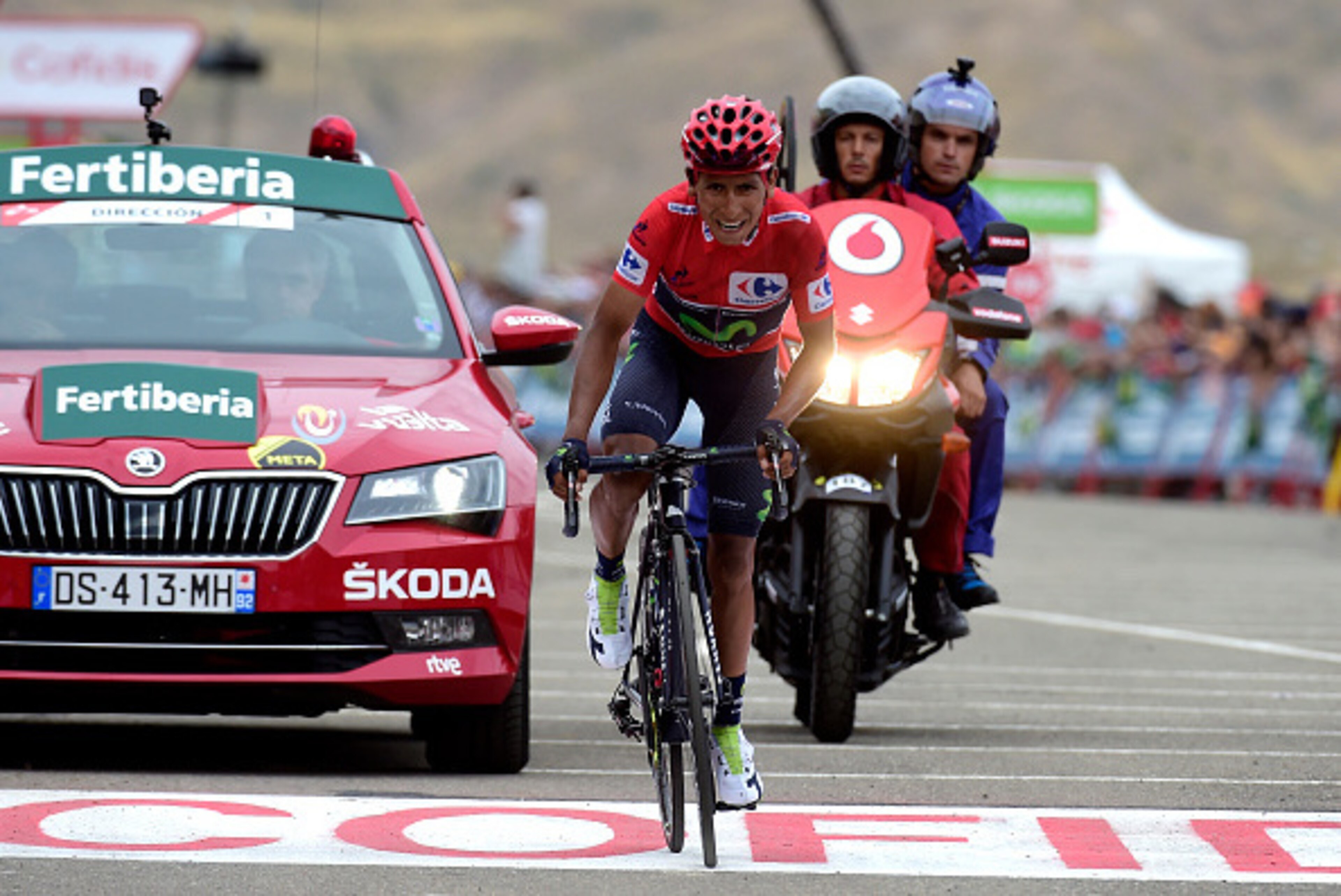 Movistar's Colombian cyclist Nairo Quintana crosses the finish line during the 15th stage of the 71st edition of 'La Vuelta' Tour of Spain, a 120km route Sabinanigo to Formigal, on September 4, 2016. / AFP / JOSE JORDAN        (Photo credit should read JO