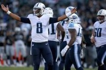 Aug 27, 2016; Oakland, CA, USA; Tennessee Titans quarterback Marcus Mariota (8) looks towards the sideline during a break in the action against the Oakland Raiders in the second quarter at Oakland Alameda Coliseum. Mandatory Credit: Cary Edmondson-USA TOD