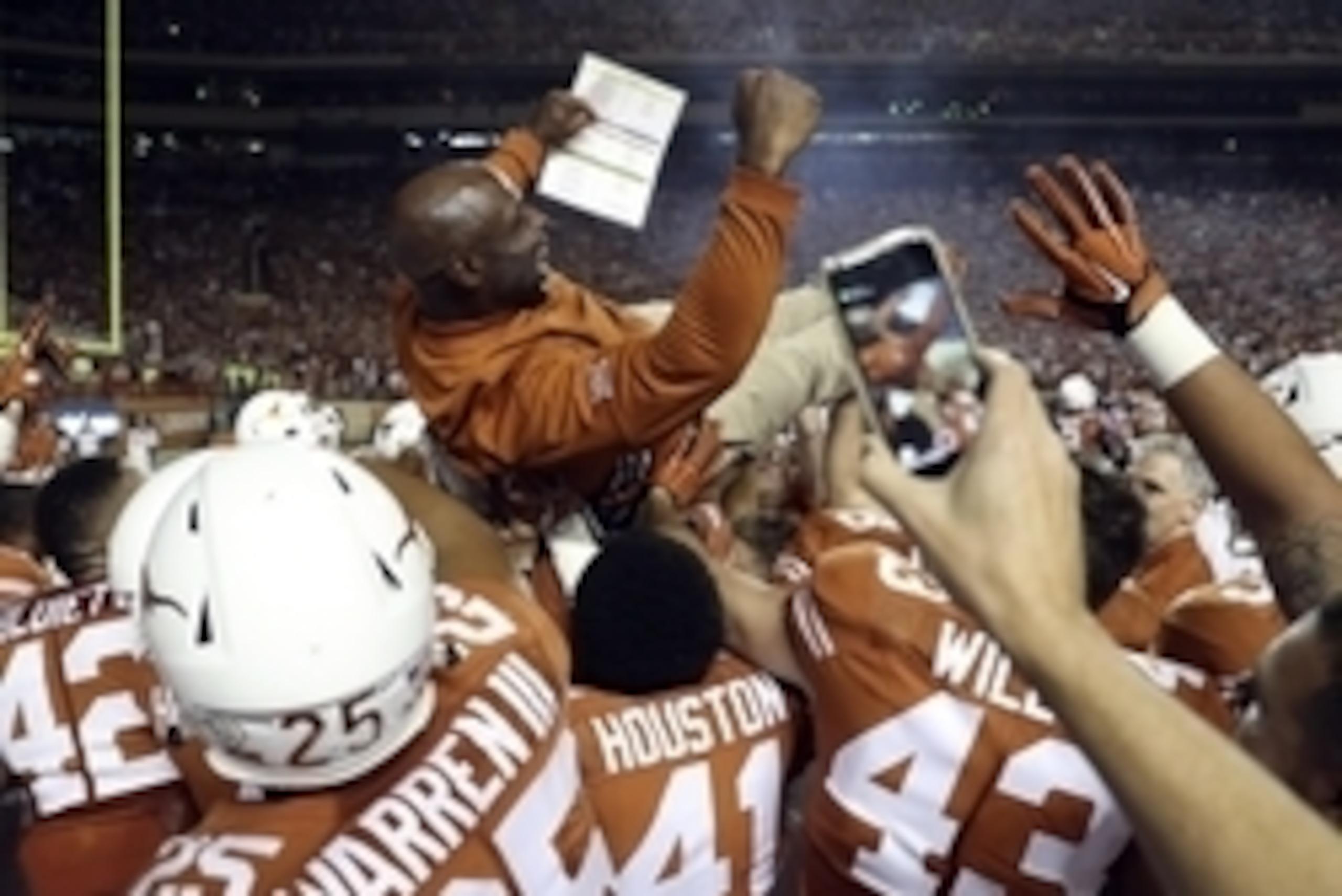 Sep 4, 2016; Austin, TX, USA; Texas Longhorns players lift up head coach Charlie Strong after the victory against the Notre Dame Fighting Irish at Darrell K Royal-Texas Memorial Stadium. Mandatory Credit: Kevin Jairaj-USA TODAY Sports Sep 4, 2016; Austin, TX, USA; Texas Longhorns players lift up head coach Charlie Strong after the victory against the Notre Dame Fighting Irish at Darrell K Royal-Texas Memorial Stadium. Mandatory Credit: Kevin Jairaj-USA TODAY Sports