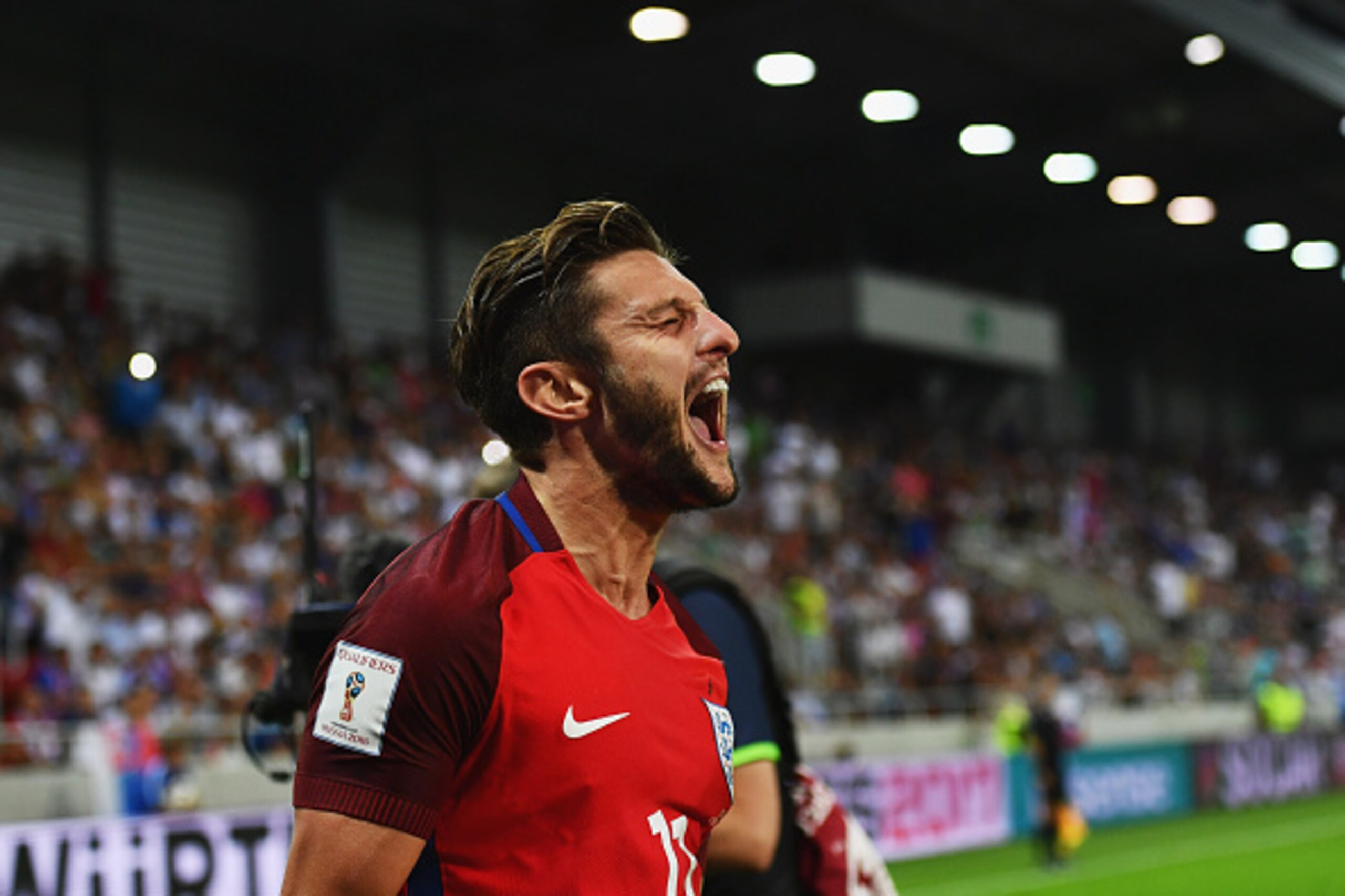 TRNAVA, SLOVAKIA - SEPTEMBER 04:  Adam Lallana of England as he scores their first goal during the 2018 FIFA World Cup Group F qualifying match between Slovakia and England at City Arena on September 4, 2016 in Trnava, Slovakia.  (Photo by Dan Mullan/Gett