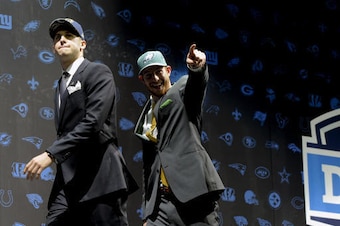 Jared Goff and Carson Wentz are the new rookie quarterbacks of Sam Bradford's former teams.