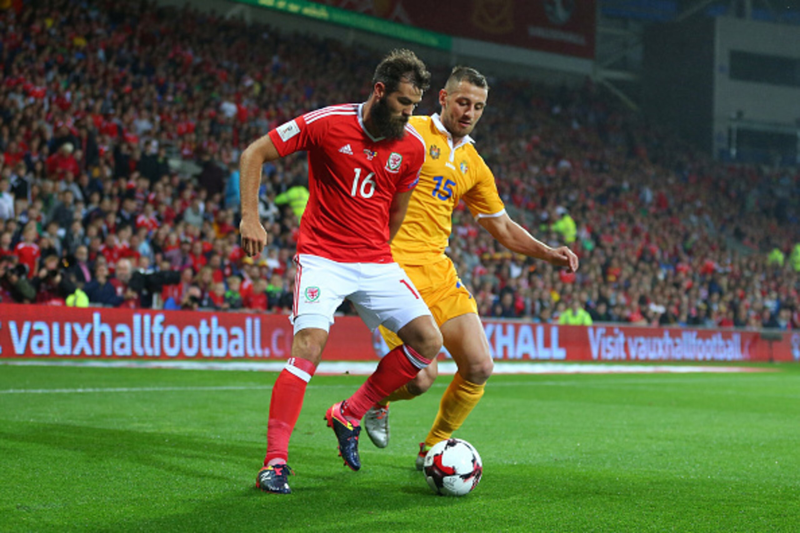CARDIFF, WALES - SEPTEMBER 05: Joe Ledley of Wales and Adrian Cascaval of Moldova during the 2018 FIFA World Cup Group D qualifying match between Wales and Moldova at Cardiff City Stadium on September 5, 2016 in Cardiff, Wales. (Photo by Catherine Ivill -