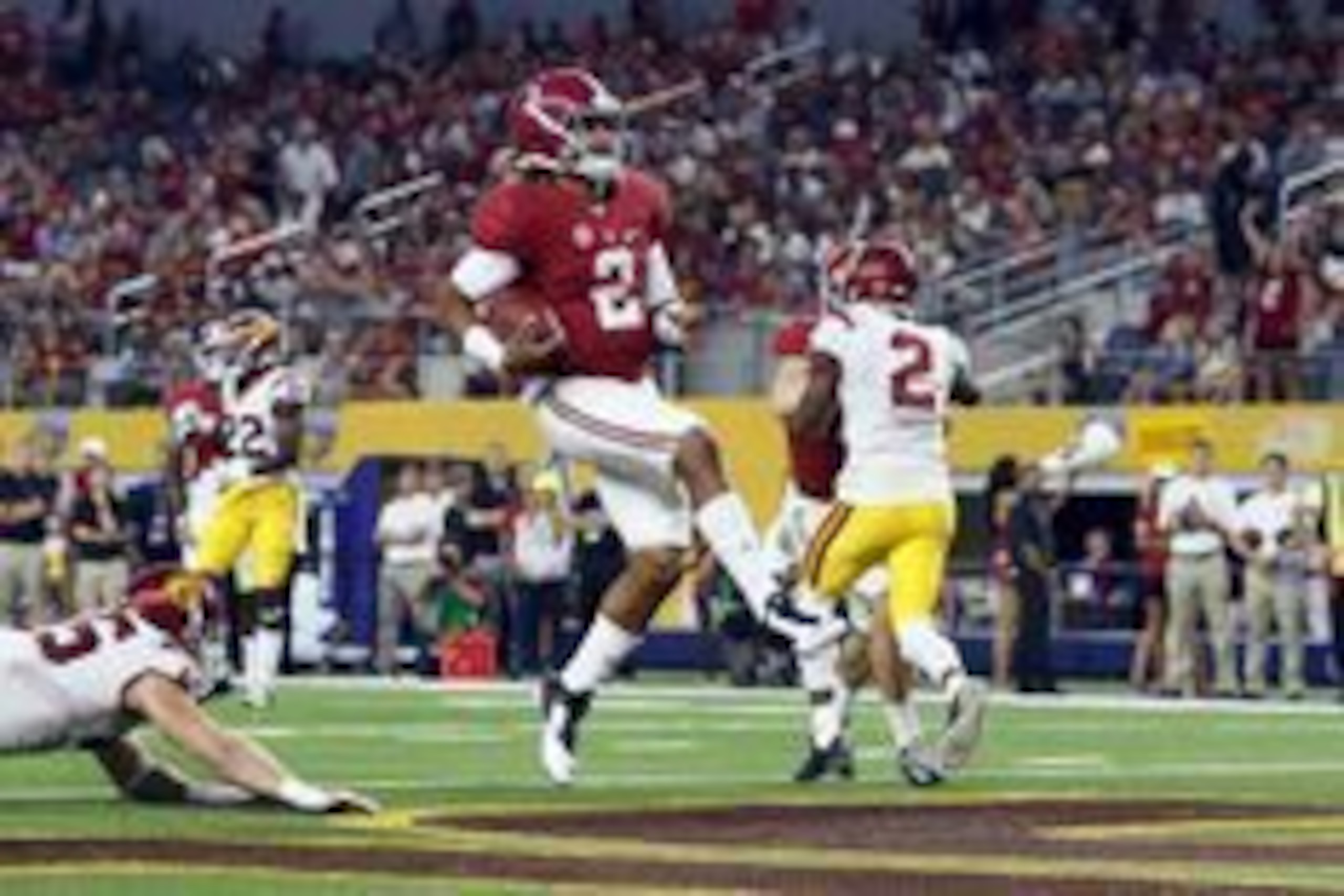 Sep 3, 2016; Arlington, TX, USA; Alabama Crimson Tide quarterback Jalen Hurts (2) runs for a touchdown during the third quarter against the USC Trojans at AT&T Stadium. Mandatory Credit: Tim Heitman-USA TODAY Sports