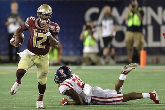 ORLANDO, FL - SEPTEMBER 05:  Deondre Francois #12 of the Florida State Seminoles runs with the ball in the second half against the Mississippi Rebels during the Camping World Kickoff at Camping World Stadium on September 5, 2016 in Orlando, Florida.  (Pho