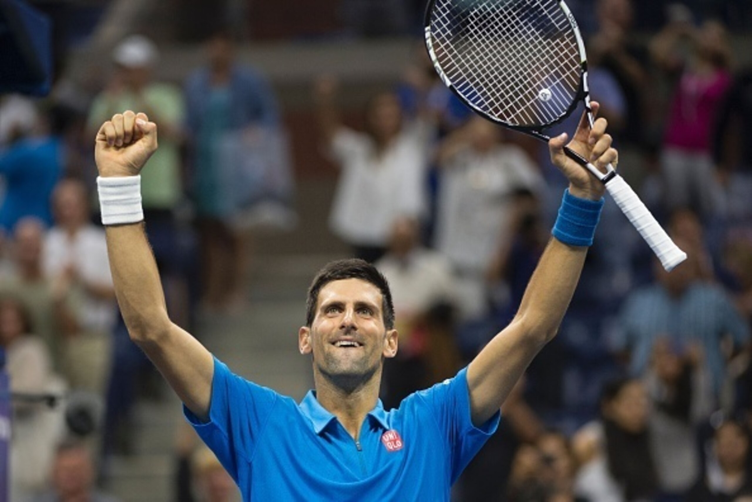 Novak Djokovic of Serbia celebrates his victory over Kyle Edmund of Great Britain during their 2016 US Open men's singles match at the USTA Billie Jean King National Tennis Center on September 4, 2016 in New York. / AFP / Don EMMERT        (Photo credit s