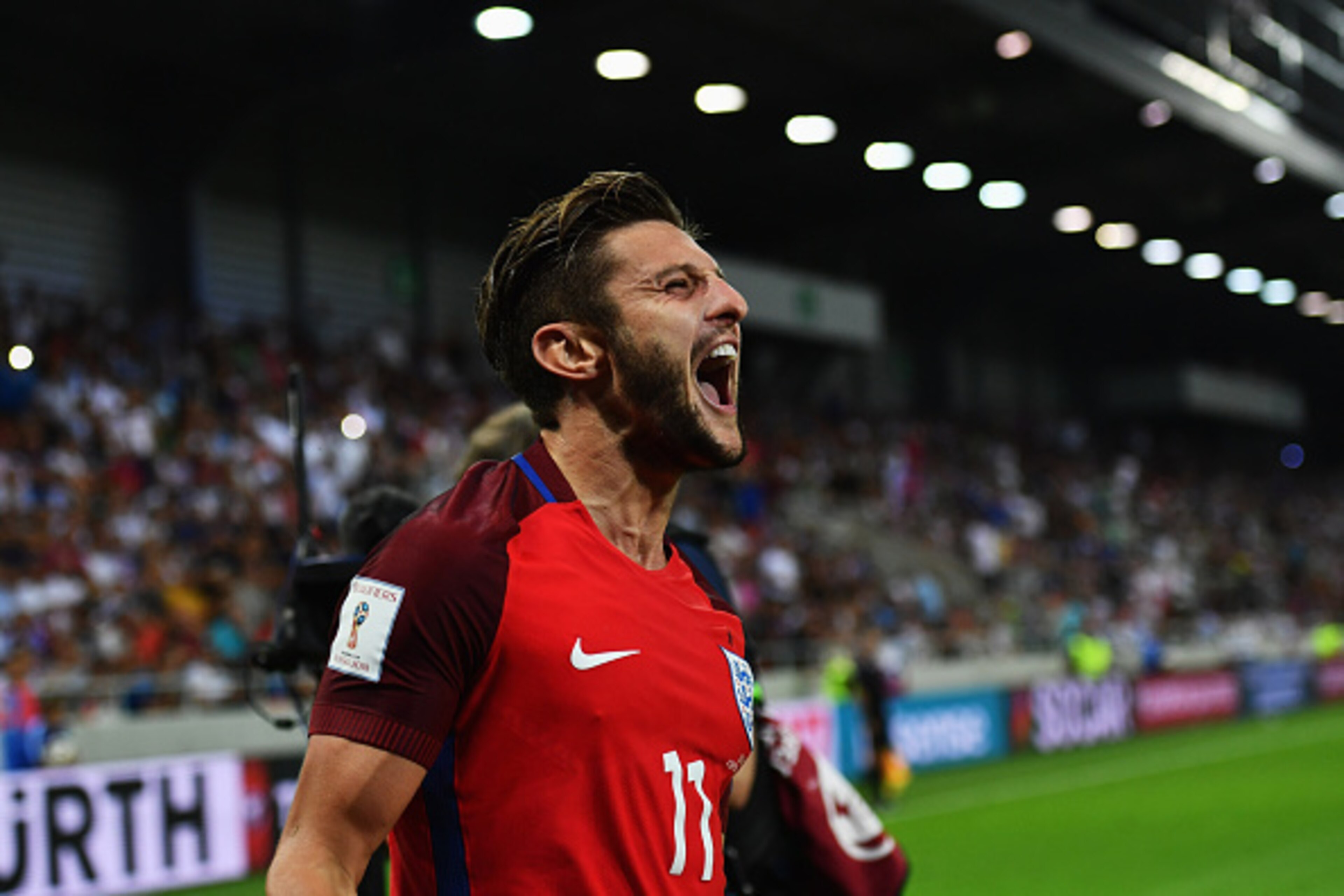 TRNAVA, SLOVAKIA - SEPTEMBER 04:  Adam Lallana of England as he scores their first goal during the 2018 FIFA World Cup Group F qualifying match between Slovakia and England at City Arena on September 4, 2016 in Trnava, Slovakia.  (Photo by Dan Mullan/Gett