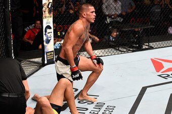 VANCOUVER, BC - AUGUST 27:  (R-L) Anthony Pettis of the United States submits Charles Oliveira of Brazil in their featherweight bout during the UFC Fight Night event at Rogers Arena on August 27, 2016 in Vancouver, British Columbia, Canada. (Photo by Jeff