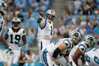 CHARLOTTE, NC - AUGUST 26:  Cam Newton #1 of the Carolina Panthers signals to his receiver against the New England Patriots in the 1st quarter during their game at Bank of America Stadium on August 26, 2016 in Charlotte, North Carolina.  (Photo by Streete