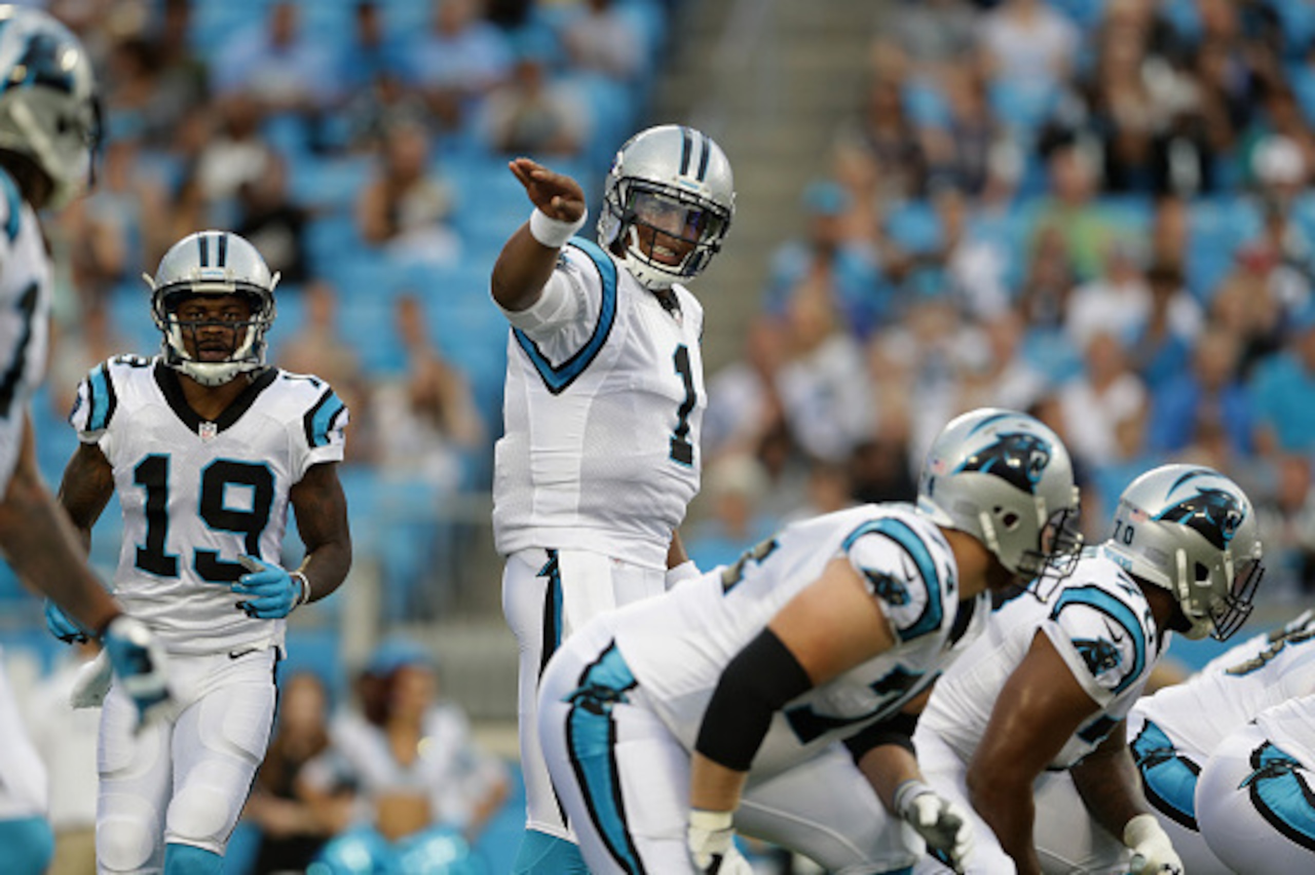 CHARLOTTE, NC - AUGUST 26:  Cam Newton #1 of the Carolina Panthers signals to his receiver against the New England Patriots in the 1st quarter during their game at Bank of America Stadium on August 26, 2016 in Charlotte, North Carolina.  (Photo by Streete