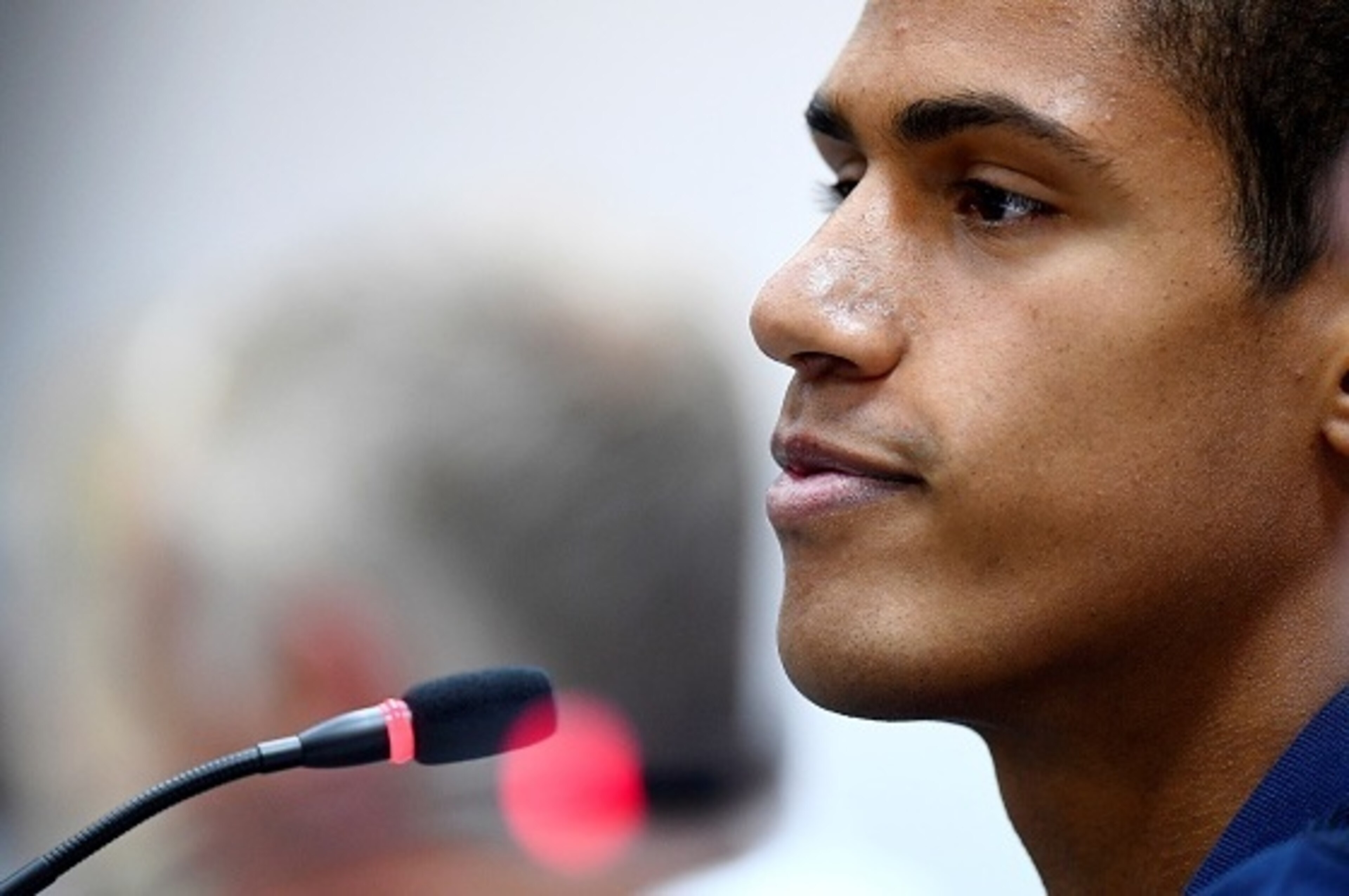 France's defender Raphael Varane gives a press conference at the National Football Center in Minsk, on September 5, 2016, on the eve of the FIFA World Cup 2018 qualifying football match against Belarus.  / AFP / FRANCK FIFE        (Photo credit should rea