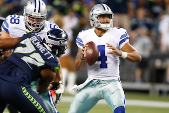 Aug 25, 2016; Seattle, WA, USA; Dallas Cowboys quarterback Dak Prescott (4) looks to pass against the Seattle Seahawks during the second quarter at CenturyLink Field. Seattle defeated Dallas, 27-17. Mandatory Credit: Joe Nicholson-USA TODAY Sports