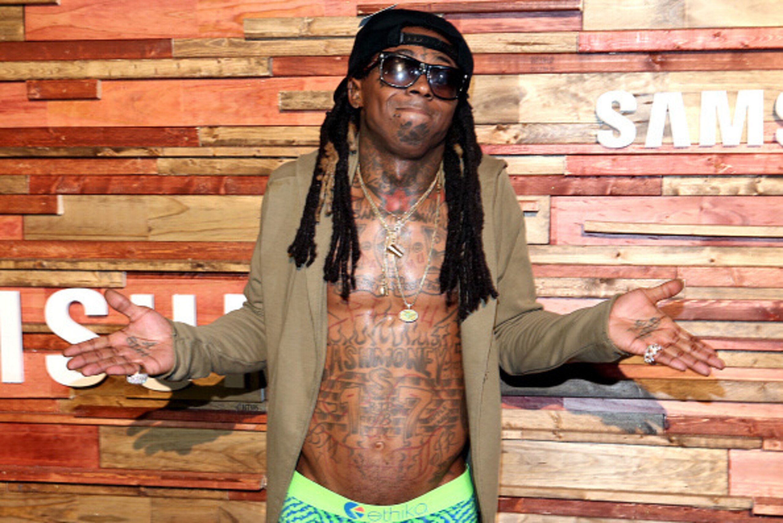 AUSTIN, TX - MARCH 12: AUSTIN, TX - MARCH: Rapper Lil Wayne attends Samsung Galaxy Life Fest at SXSW 2016 on March 12, 2016 in Austin, Texas. (Photo by Jonathan Leibson/Getty Images for Samsung) AUSTIN, TX - MARCH 12: AUSTIN, TX - MARCH: Rapper Lil Wayne attends Samsung Galaxy Life Fest at SXSW 2016 on March 12, 2016 in Austin, Texas. (Photo by Jonathan Leibson/Getty Images for Samsung)