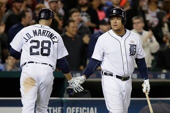 DETROIT, MI - MAY 16:  J.D. Martinez #28 of the Detroit Tigers is congratulated by Miguel Cabrera #24 of the Detroit Tigers after hitting a home run against the Minnesota Twins at Comerica Park on May 16, 2016 in Detroit, Michigan. (Photo by Duane Burleso