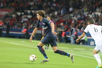 PARIS, FRANCE - AUGUST 21:  Adrien Rabiot of Paris Saint-Germain in action during the French Ligue 1 match between Paris Saint-Germain and FC Metz at Parc des Princes on August 21, 2016 in Paris, France.  (Photo by Xavier Laine/Getty Images)