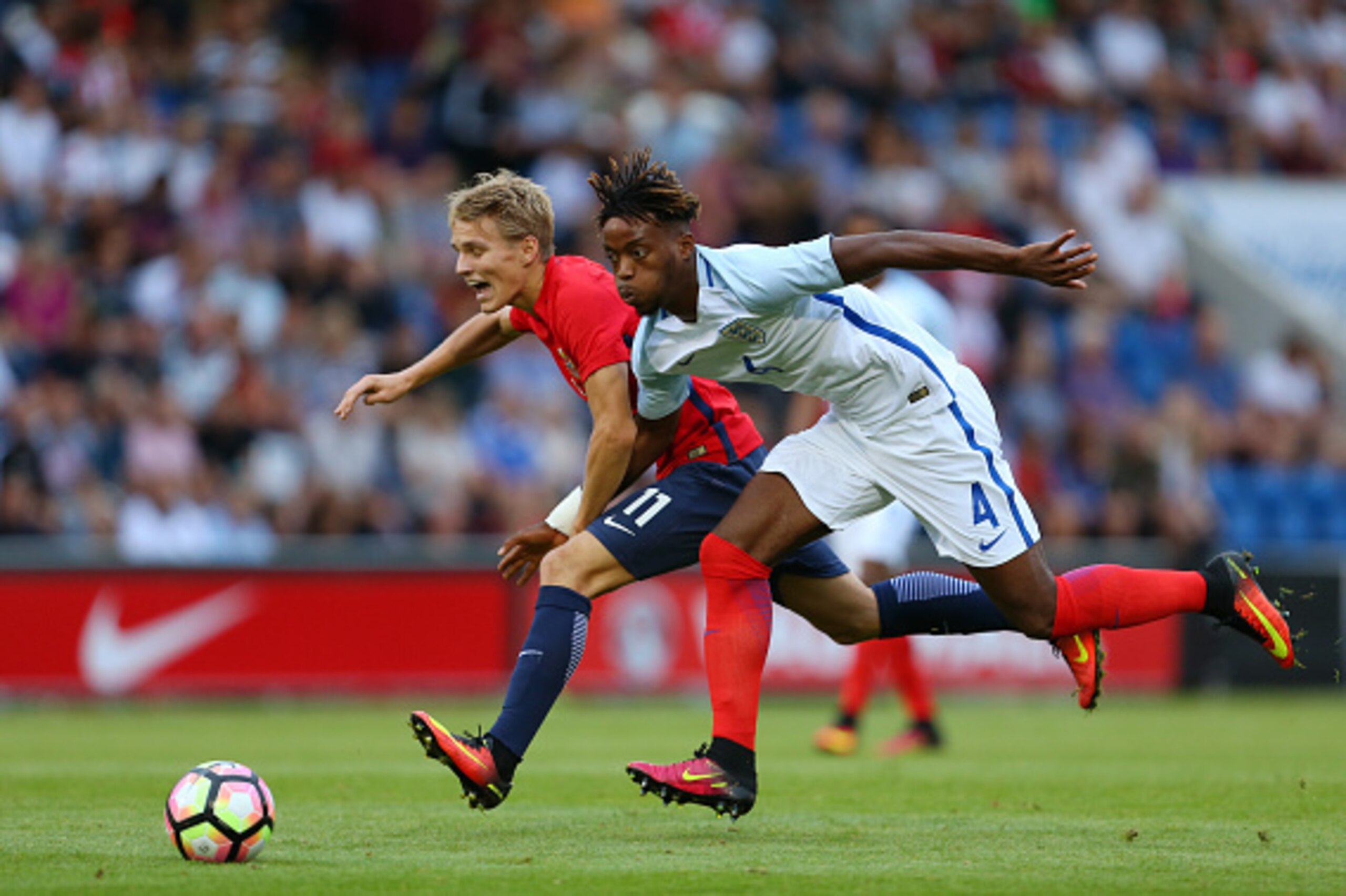 COLCHESTER, ENGLAND - SEPTEMBER 06: Martin Odegaard of Norway U21 and Nathaniel Chalobah of England U21 during the UEFA European U21 Championship Qualifier Group 9 match between England U21 and Norway U21 at Colchester Community Stadium on September 6, 20